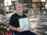 In Minnetonka on July 28, John Browning held a photo of himself from 1968. The 77-year-old Vietnam veteran struggled to find a new job for over two ye