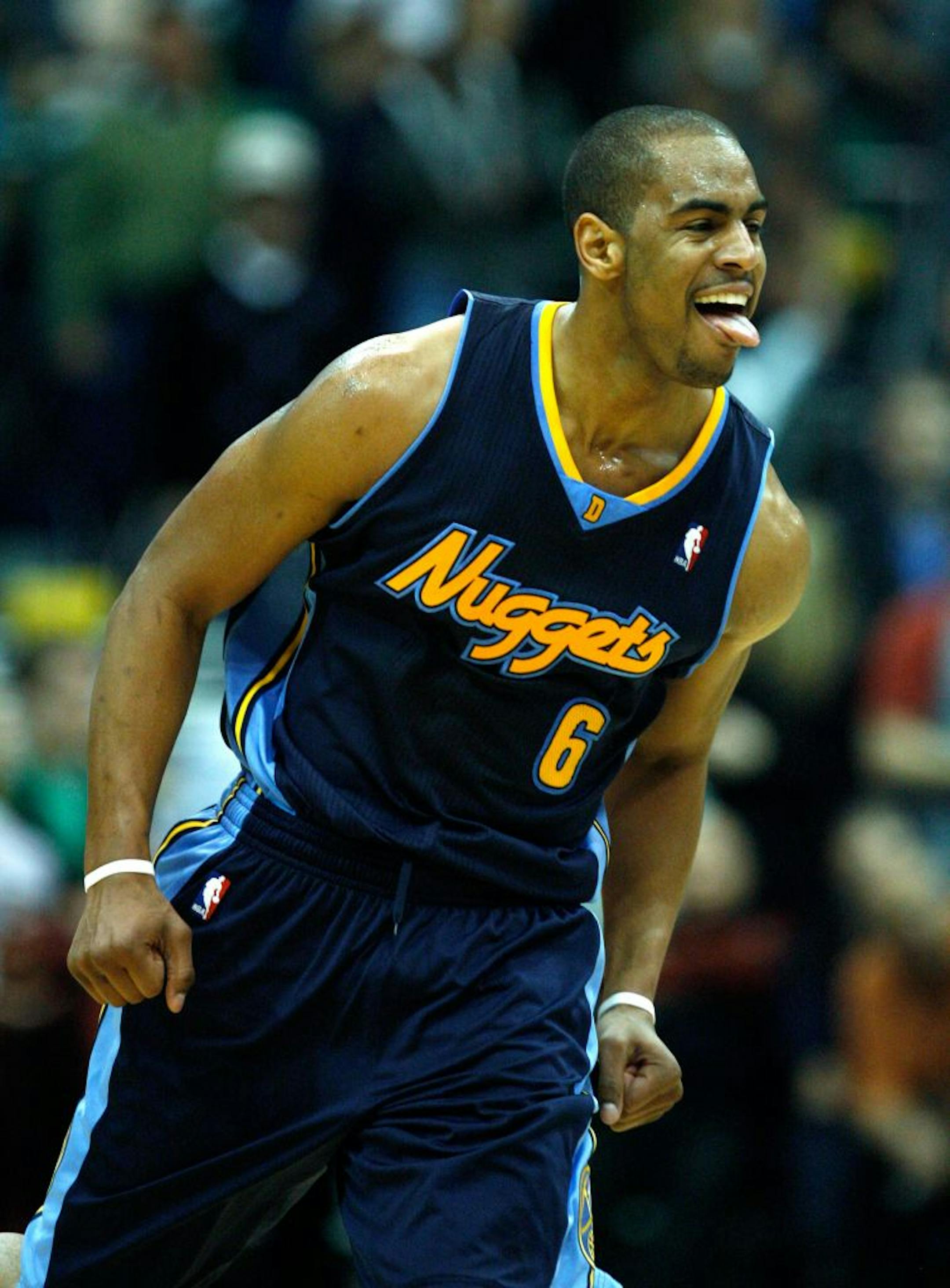 Denver Nuggets guard Arron Afflalo (6) celebrates after sinking a 3-point shot with 11.4 seconds left in their NBA basketball game against the Utah Jazz in Salt Lake City, Thursday, March 3, 2011. The Nuggets beat the Jazz 103-101.