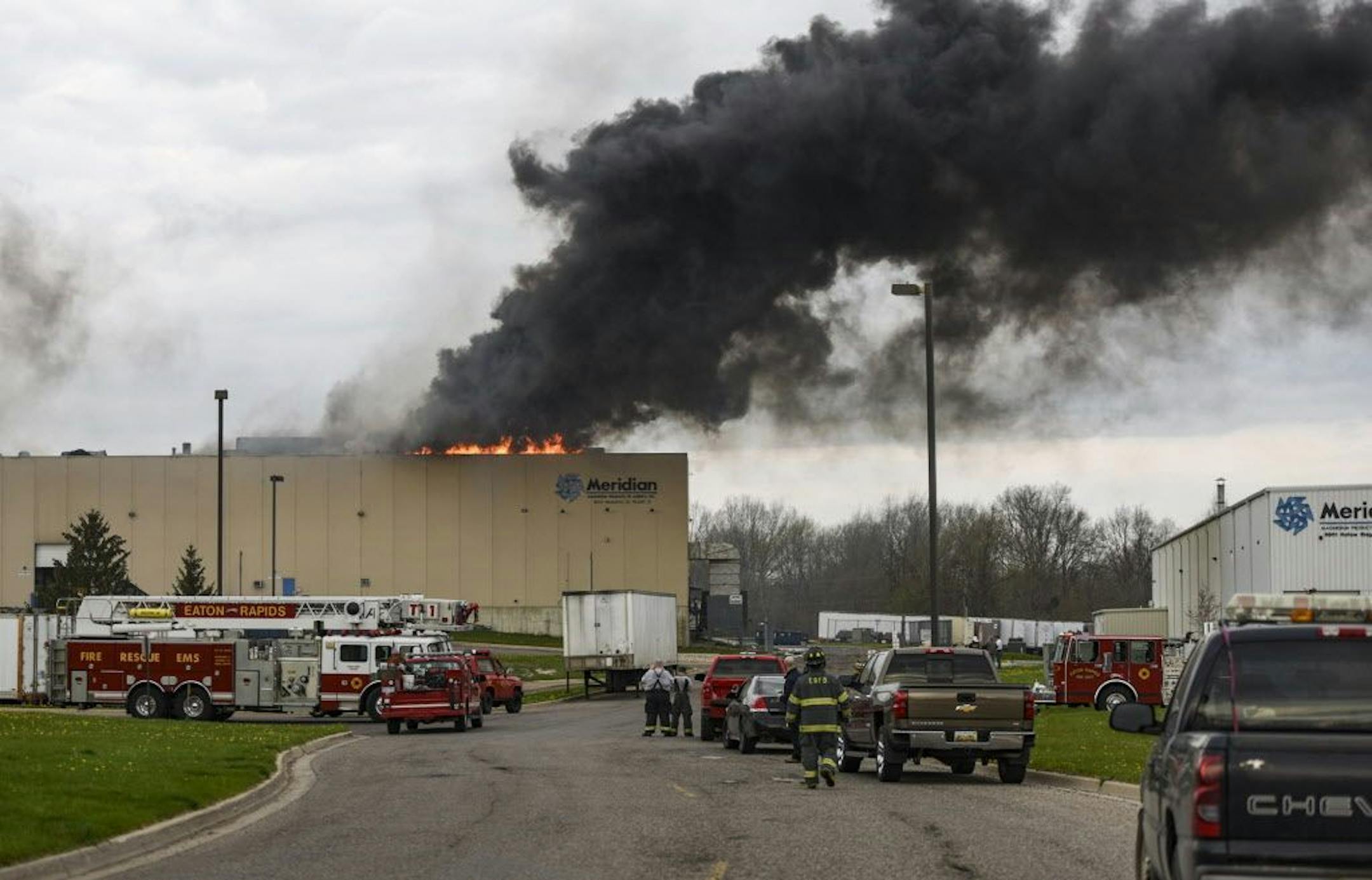 FILE - In this May 2, 2018, file photo, emergency personnel respond to a fire at Meridian Magnesium Products of America in Eaton Rapids, Mich.
