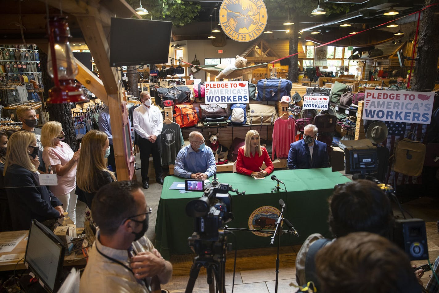 (From Left) U.S. Representative Pete Stauber, Ivanka Trump and U.S. Secretary of the Interior David Bernhardt spoke to the press in Duluth Pack in Canal Park in Duluth on Monday. The trio were there to witness Duluth Pack sign the Pledge to America's workers. ] ALEX KORMANN • alex.kormann@startribune.com Ivanka Trump, U.S. Secretary of the Interior David Bernhardt and U.S. Representative Pete Stauber toured Duluth Pack in Canal Park in Duluth on Monday July 27, 2020. The trio were there to witne