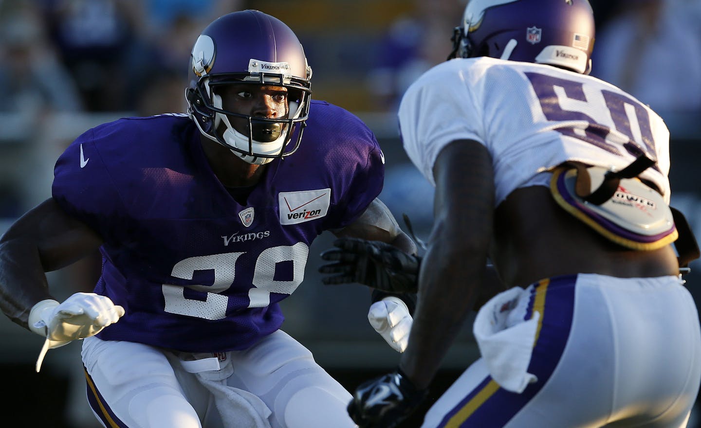 Minnesota Vikings running back Adrian Peterson (28) attempted to block Gerald Hodges (50) during a drill. ] CARLOS GONZALEZ cgonzalez@startribune.com - August 1, 2015, Mankato, MN, NFL, Minnesota Vikings Training Camp, Minnesota State University, Mankato, ORG XMIT: MIN1508021617220348