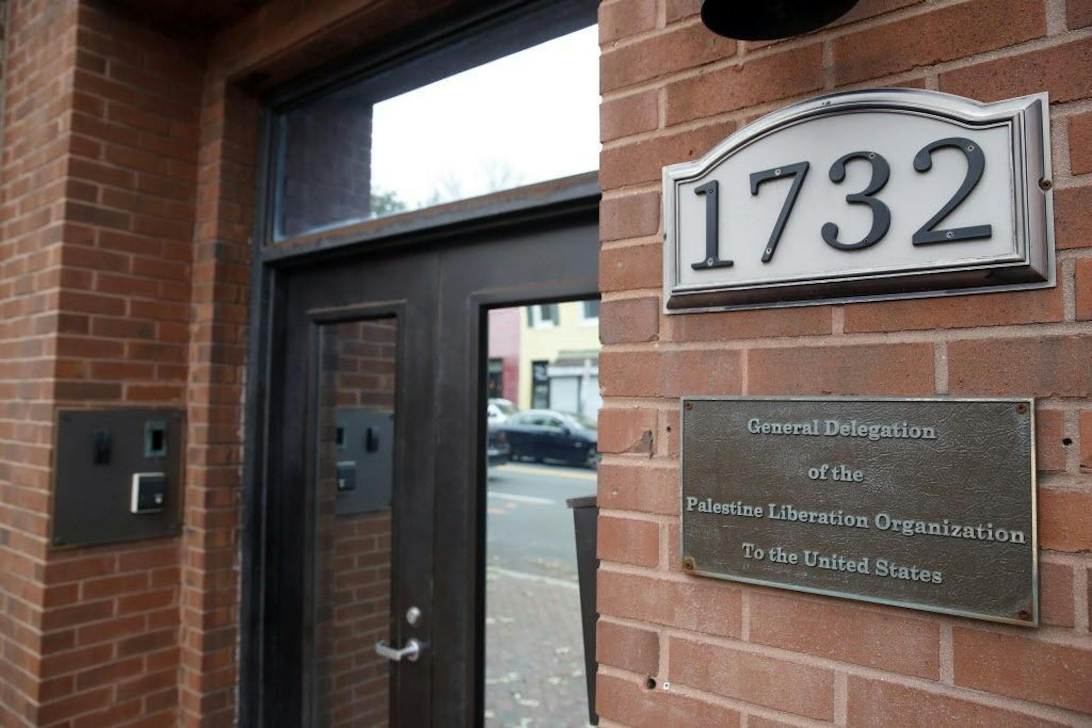 FILE - This Nov. 18, 2017 file photo shows the Washington office of the Palestine Liberation Organization. The U.S. has notified the Palestinians it's closing their mission in Washington, a senior official said Monday, Sept. 10, 2018, the latest in a series of American blows to the Palestinians. A provision in a U.S. law says the PLO mission must close if the Palestinians try to get the International Criminal Court to prosecute Israelis for crimes against Palestinians.