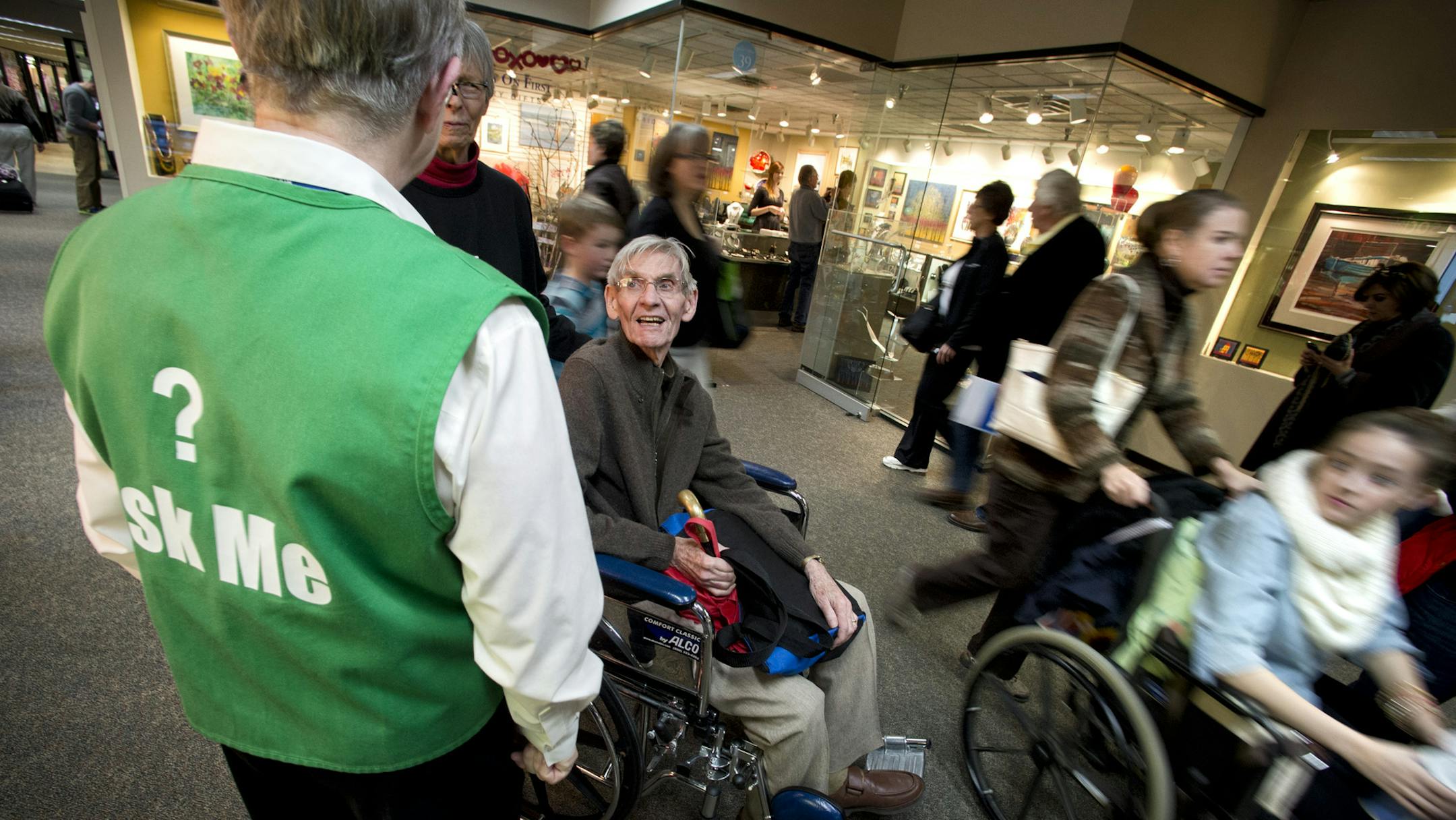 The clinic draws patients from all 50 states and more than 130 countries each year. Community Hosts in green vests volunteer to help visitors such as Sue and Bill Ammerman of River Falls, Wis., navigate the sprawling campus.