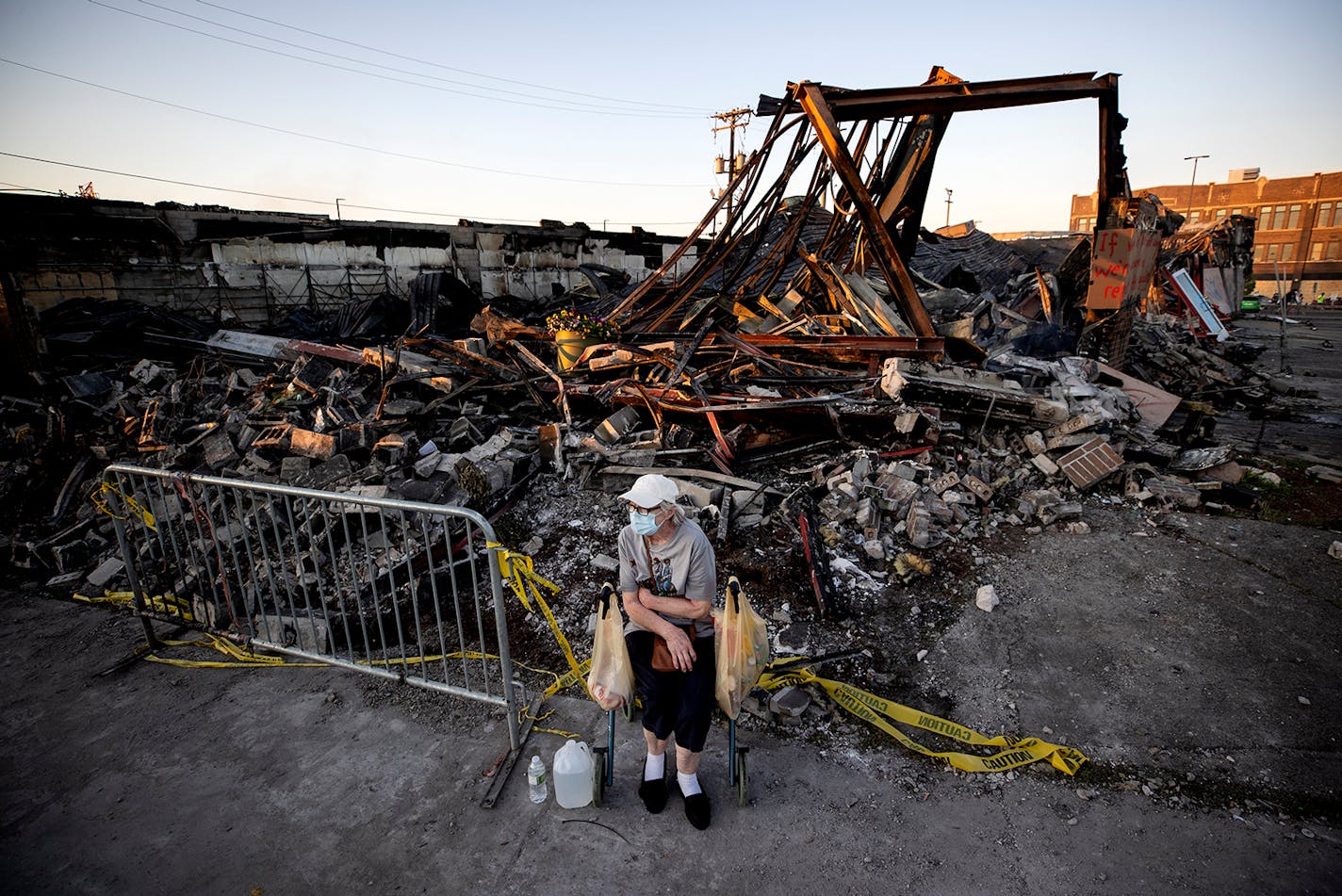 Sandra King, 70, waited for her granddaughter near the remains of AutoZone across from the Minneapolis 3rd Police Precinct.