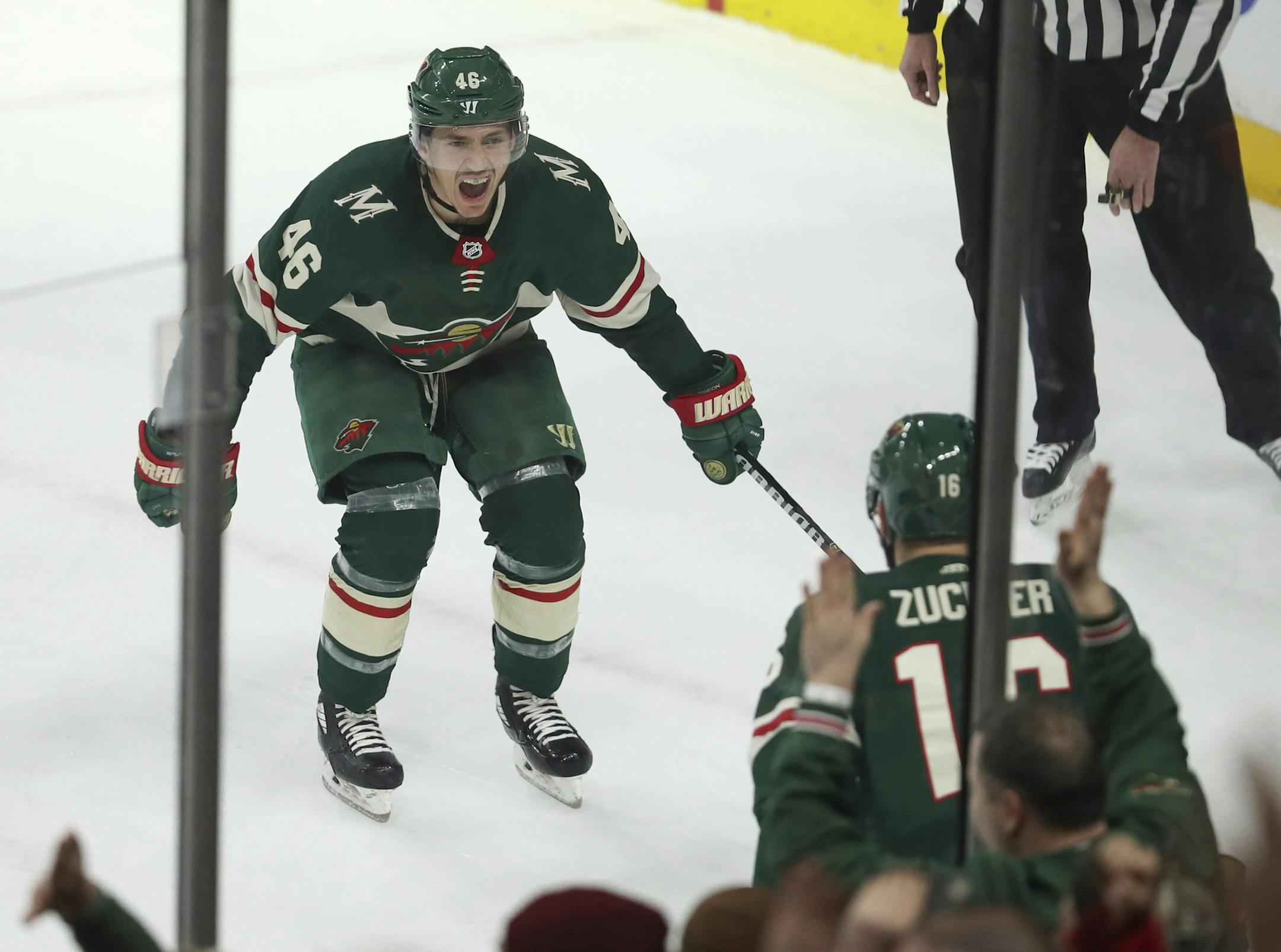 Wild defenseman Jared Spurgeon celebrated a game-winning overtime goal with Jason Zucker.