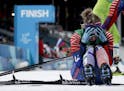 Jessie Diggins, of the United States, celebrates after winning the gold medal in the during women's team sprint freestyle cross-country skiing final a