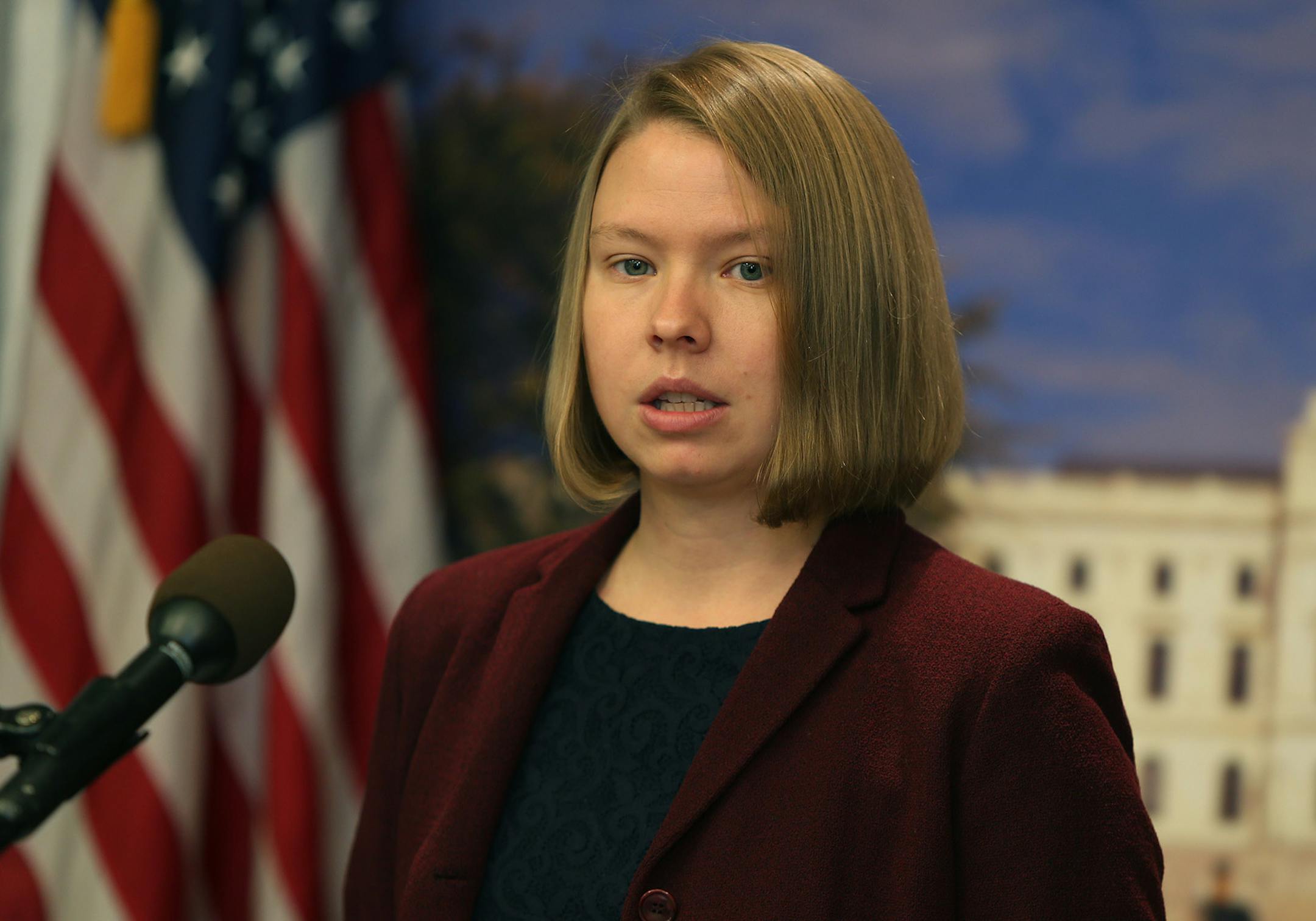 Anna Brelje, a victim of Wells Fargo's payday loan-like "deposit advance" product (short term high interest loan), talked about her case in a press conference at the State Capitol, Tuesday, November 12, 2013. Brelje joined the Joint Religious Legislative Coalition to call for an end to predatory payday loan practices. A new payday report is showing an explosive growth of payday lending in Minnesota. (ELIZABETH FLORES/STAR TRIBUNE) ELIZABETH FLORES &#x2022; eflores@startribune.com
