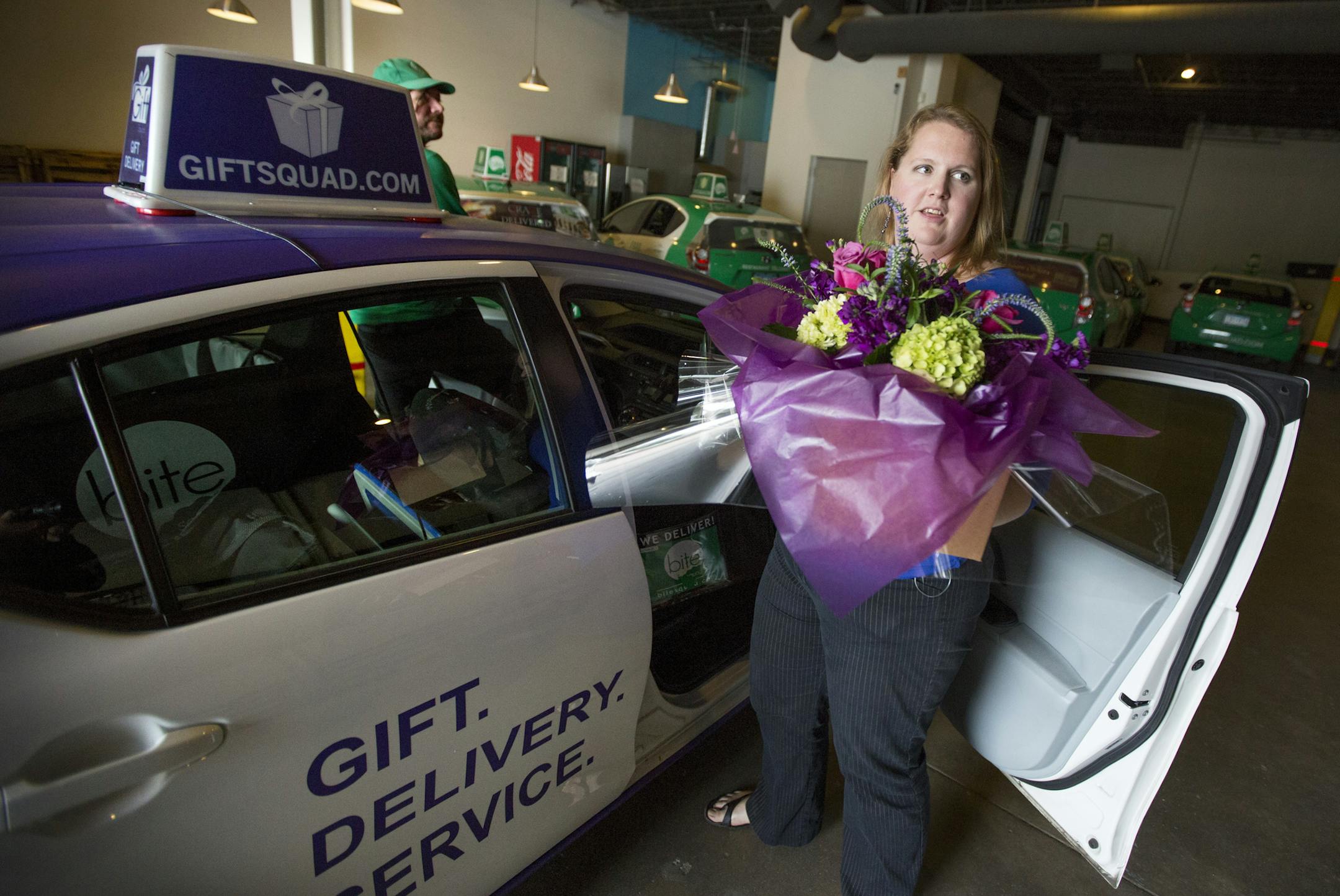 Bite Squad restaurant delivery service, is expanding into floral delivery with the newly launched Gift Squad. Here floral designer Britta briings an arrangement to a driver for delivery. BRIAN PETERSON &#x201a;&#xc4;&#xa2; brian.peterson@startribune.com Minneapolis, MN 0912/14
