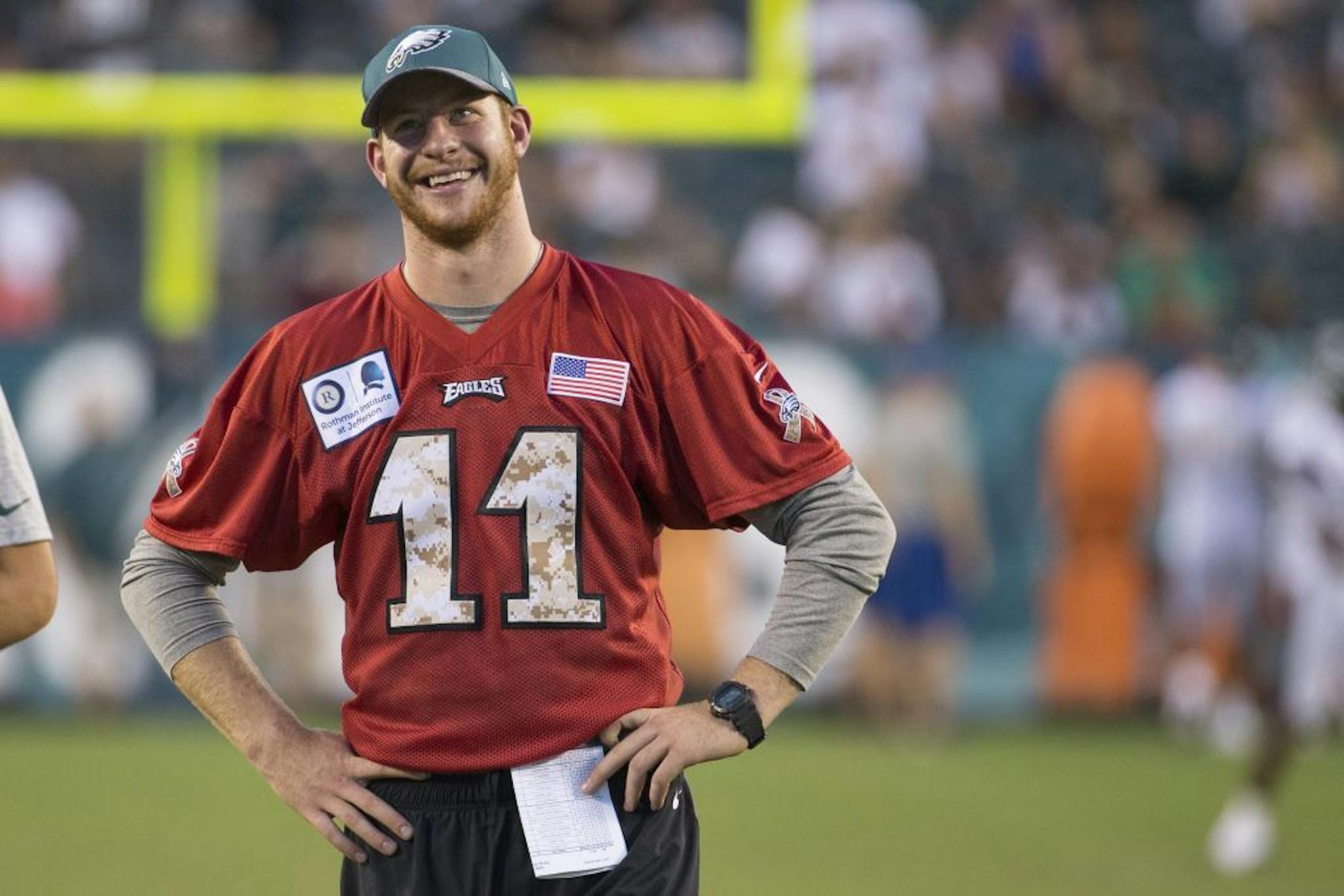 Philadelphia Eagles quarterback Carson Wentz (11) looks on during practice at NFL football training camp, Sunday, Aug. 14, 2016, in Philadelphia.
