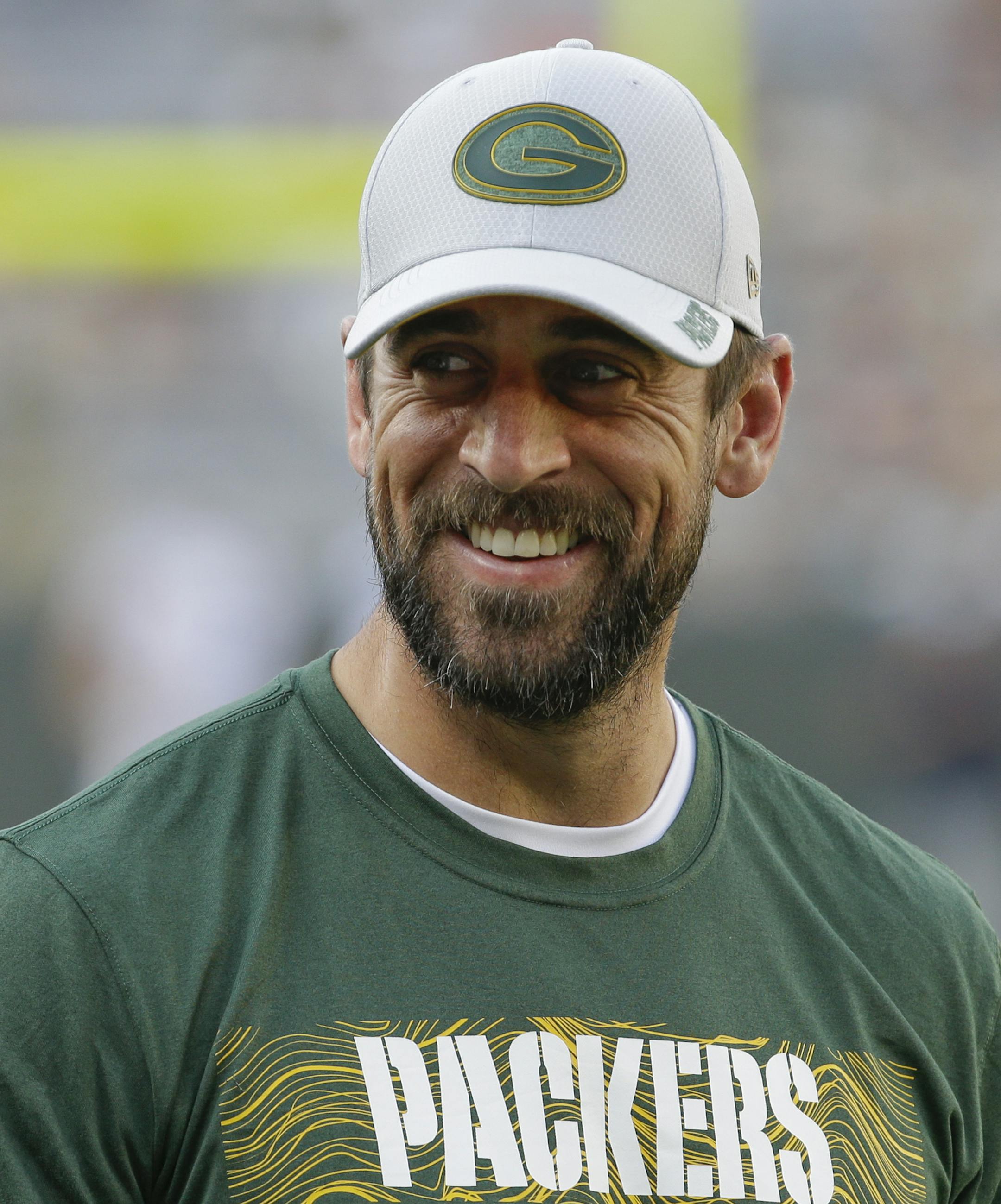 Green Bay Packers' Aaron Rodgers watches warm ups before a preseason NFL football game against the Tennessee Titans Thursday, Aug. 9, 2018, in Green Bay, Wis. (AP Photo/Mike Roemer)