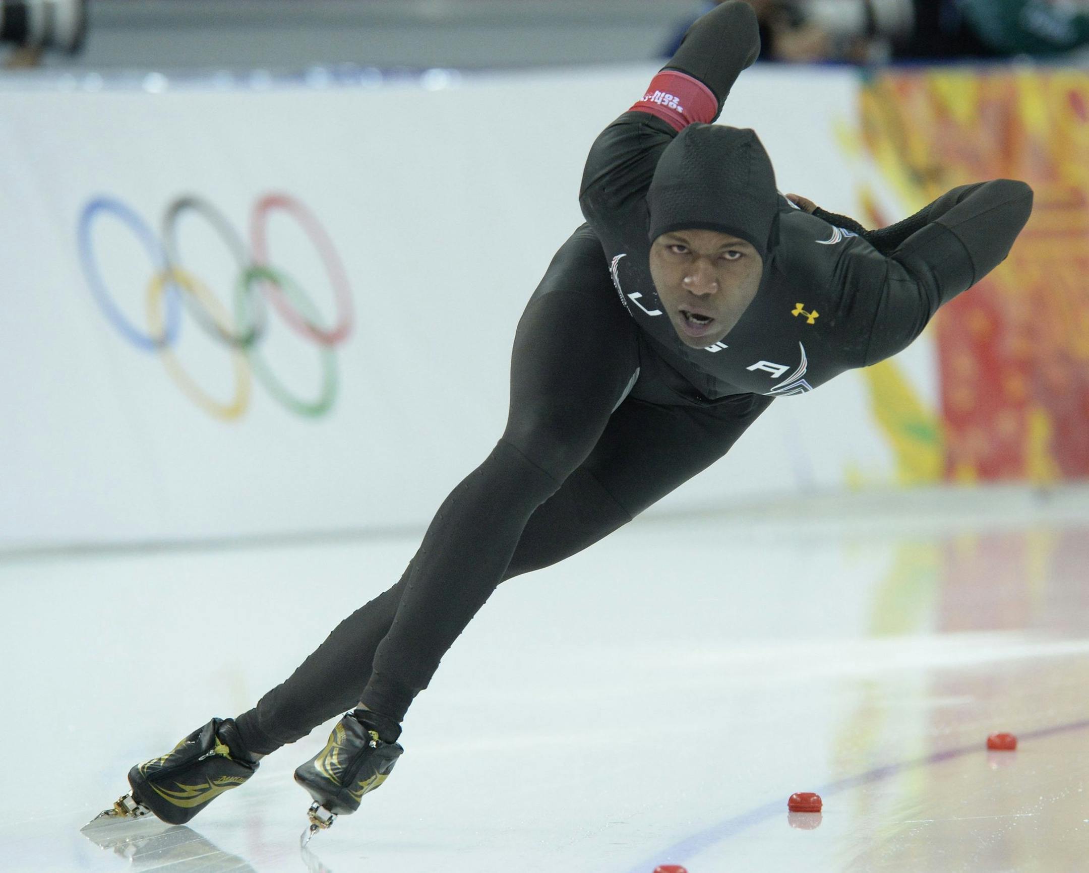 U.S. speed skater Shani Davis competes in the men's 1000-meters event during the Winter Olympics in Sochi, Russia, on Wednesday, Feb. 12, 2014. (Mark Reis/Colorado Springs Gazette/MCT)
