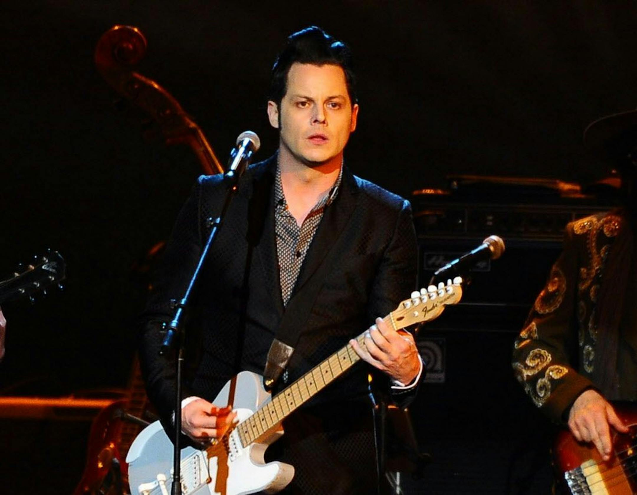 FILE - In this Feb. 6, 2015 file photo, Jack White performs at the 2015 MusiCares Person of the Year show at the Los Angeles Convention Center in Los Angeles. White says he�s about to take a long break from performing live but not before holding five mysterious, acoustic-only shows in the five states where he hasn�t yet played. The performances will be announced at 8 a.m., local time, on the day of the show. Tickets will cost just $3, be limited to one per person and available only at the venue