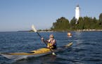 provided photo Door County Wisconsin, - Cana Island lighthouse kayakers