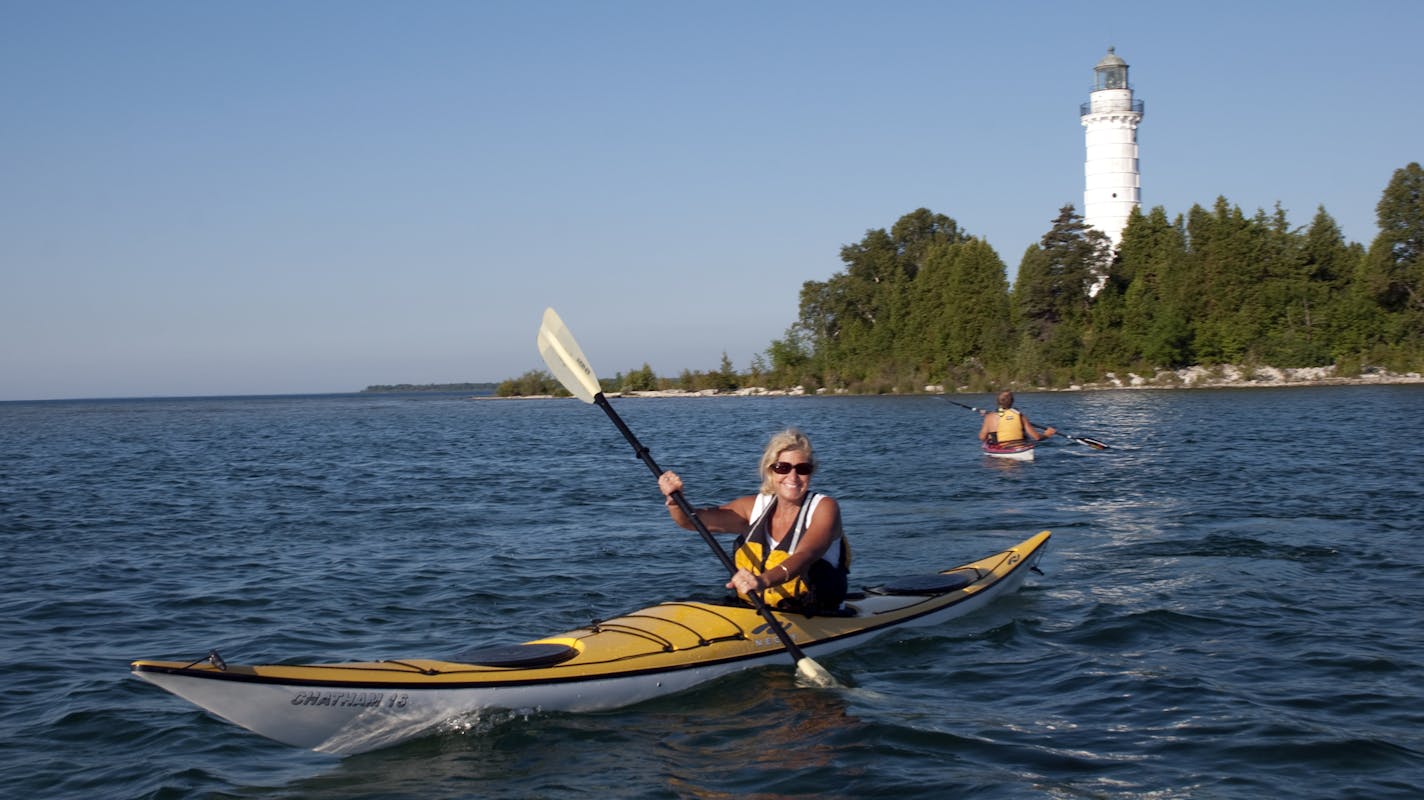 provided photo Door County Wisconsin, - Cana Island lighthouse kayakers