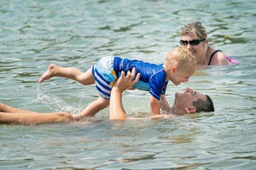 Easton Zarras, 2 was having a wonderful time playing with his brother Mitchell, 16 as they cooled off at SandVenture Aquatic Park in Shakopee.