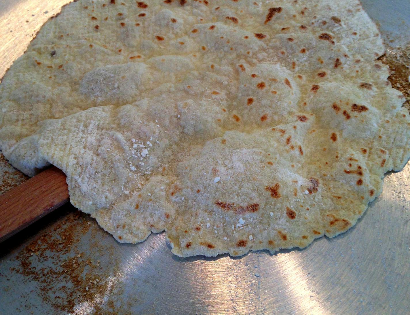 Fresh lefse on the griddle, made by women at Central Lutheran Church. (Lee Svitak Dean/Star Tribune)