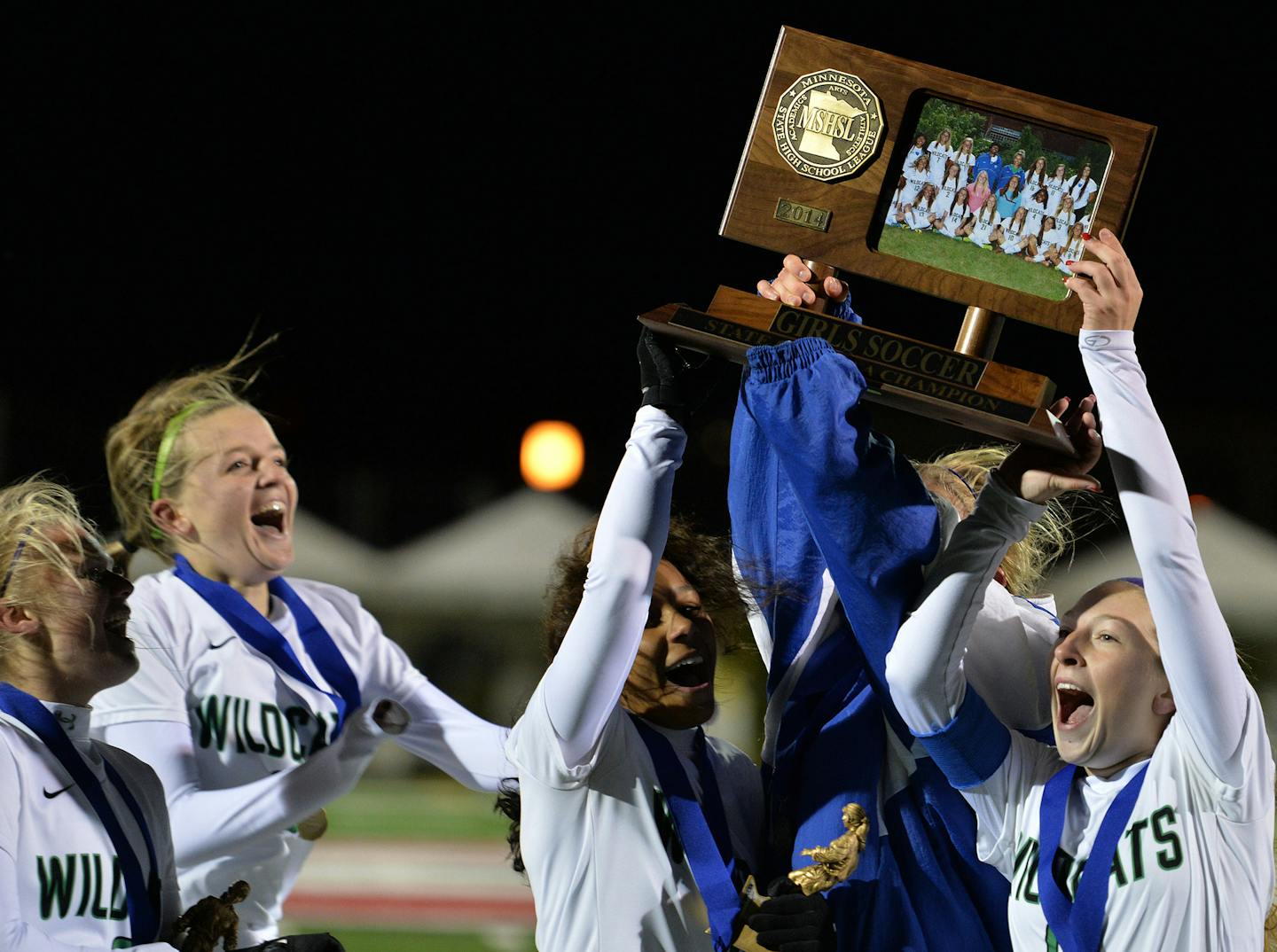 Eagan teammates celebrate their Class 2A championship following their 1-0 victory over Eden Prairie names them the 2014 Class 2A Girls champions. ] (SPECIAL TO THE STAR TRIBUNE/BRE McGEE)