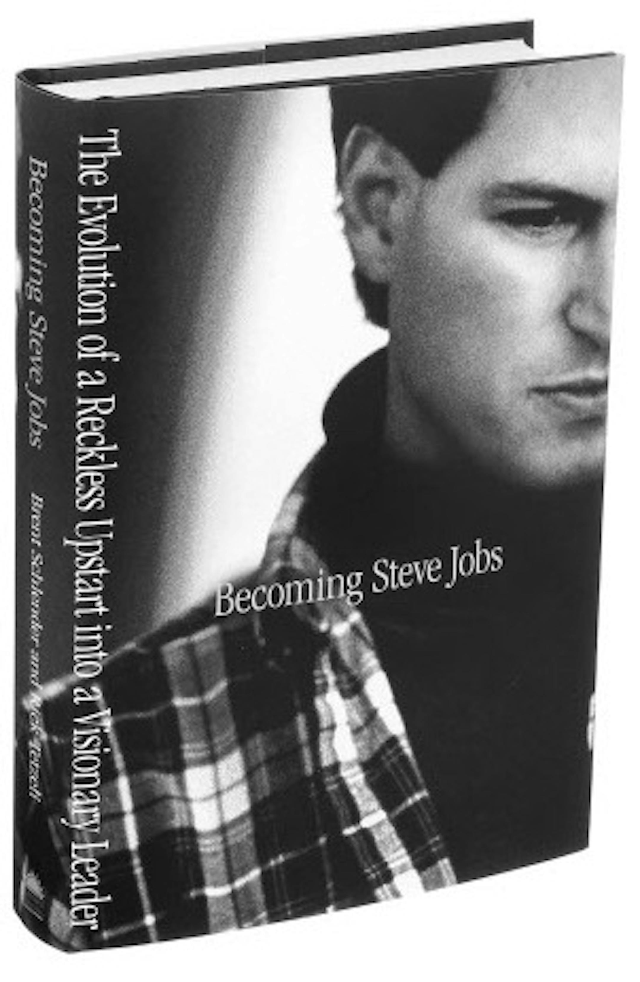 The book "Becoming Steve Jobs," an unauthorized biography by Brent Schlender and Rick Tetzeli, published by Crown Business, in New York, March 19, 2015. Top Apple brass are promoting the new unauthorized biography &#x201c;Becoming Steve Jobs,&#x201d; in which they criticize the depiction of Jobs in an earlier authorized biography, "Steve Jobs," by Walter Isaacson. (Alessandra Montalto/The New York Times)