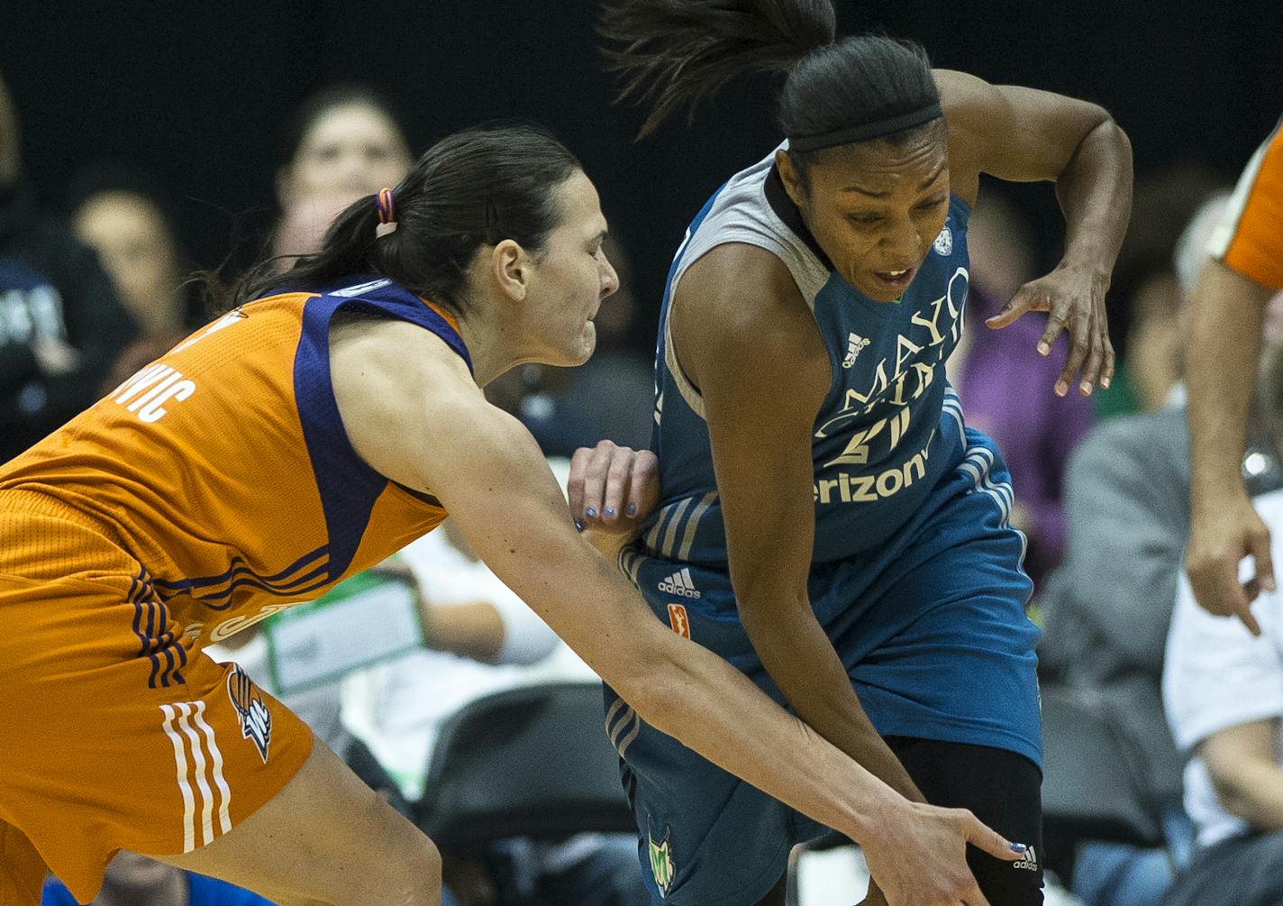 Minnesota Lynx guard Renee Montgomery (21) was fouled by Phoenix Mercury forward Sonja Petrovic (5) in the second quarter Saturday. ] (AARON LAVINSKY/STAR TRIBUNE) aaron.lavinsky@startribune.com The Minnesota Lynx played the Phoenix Mercury on Saturday, May 14, 2016 at Target Center in Minneapolis, Minn.