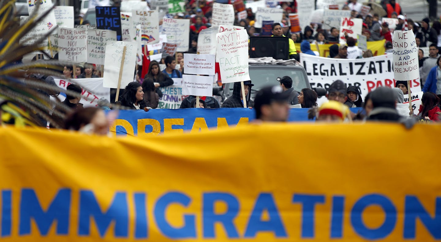 Marchers made their way to the State Capitol during the May Day March and Rally for immigration reform on Wednesday. ] CARLOS GNZALEZ cgonzalez@startribune.com May 1, 2013, St. Paul, Minn., May Day March and Rally for immigration reform ally on the lawn of the Minnesota State Capitol,