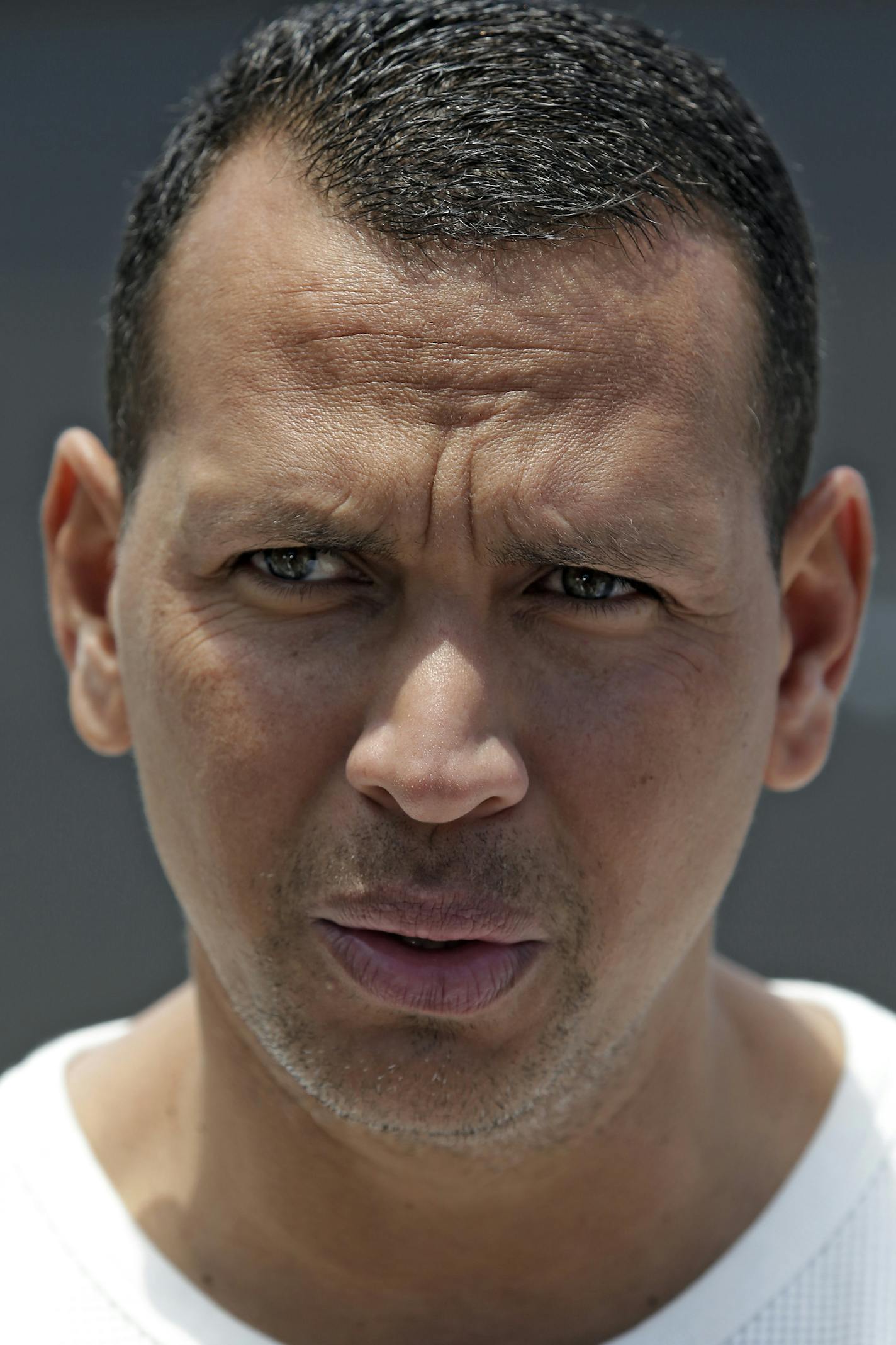 New York Yankees third baseman Alex Rodriguez talks to reporters after arriving at the Yankees Minor League complex Monday, May 6, 2013 in Tampa, Fla., (AP Photo/Chris O'Meara) ORG XMIT: MIN2013060420283205