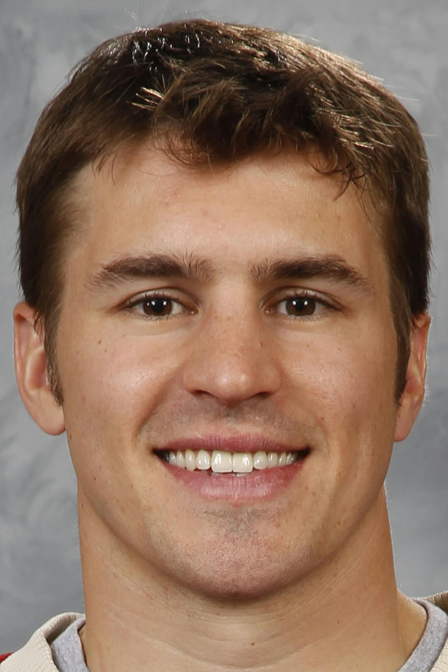 ST. PAUL, MN - SEPTEMBER 18: Zach Parise #11 of the Minnesota Wild poses for his official headshot for the 2014-2015 season on September 18, 2014 at the Xcel Energy Center in St. Paul, Minnesota. (Eric Miller/NHLI via Getty Images) ORG XMIT: 503032693