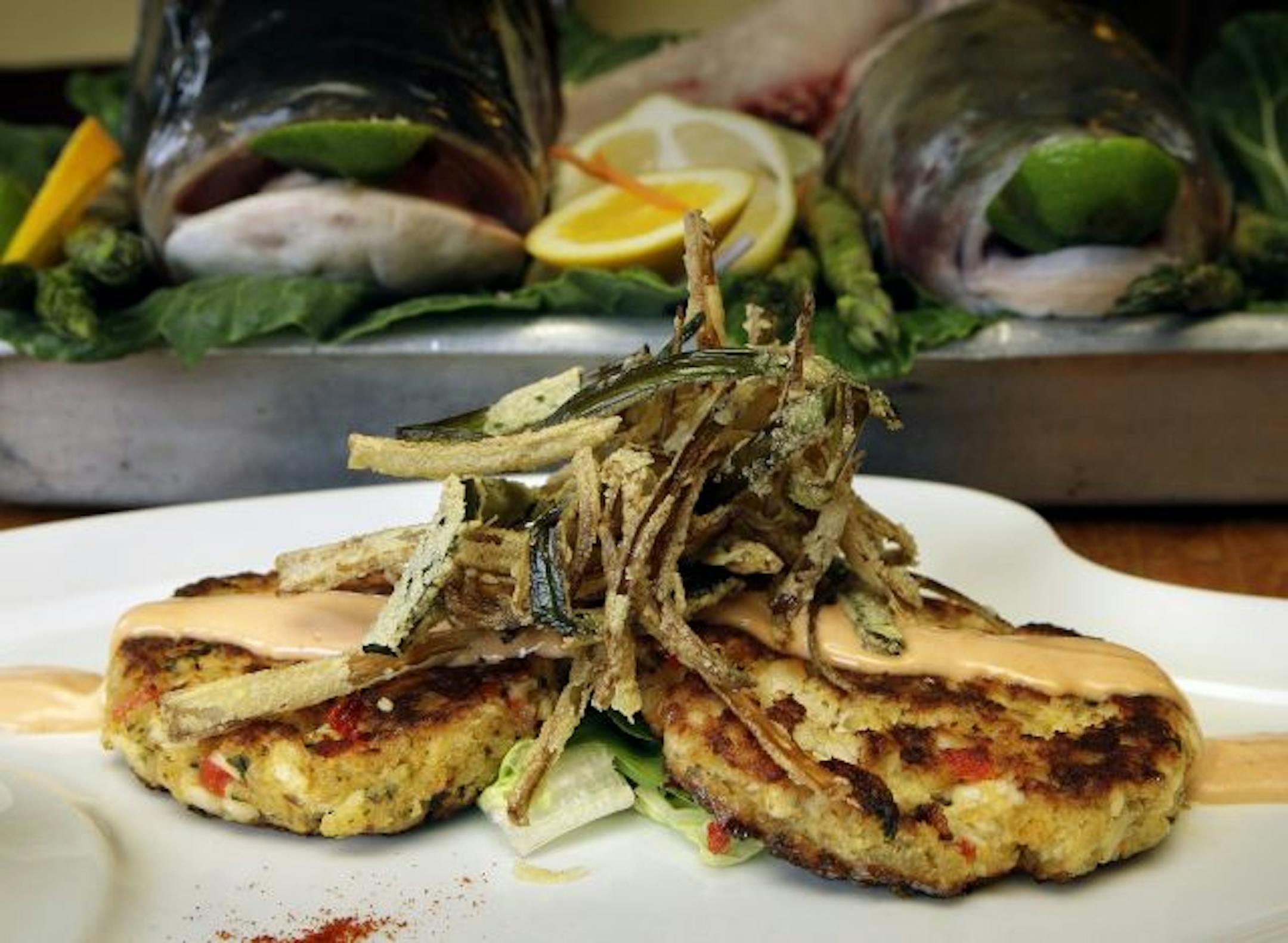 Asian carp steak with Cajun remoulade is featured on the menu at the Heaven City Restaurant in Mukwonago, Wis., creators of ''Invasivore Night."