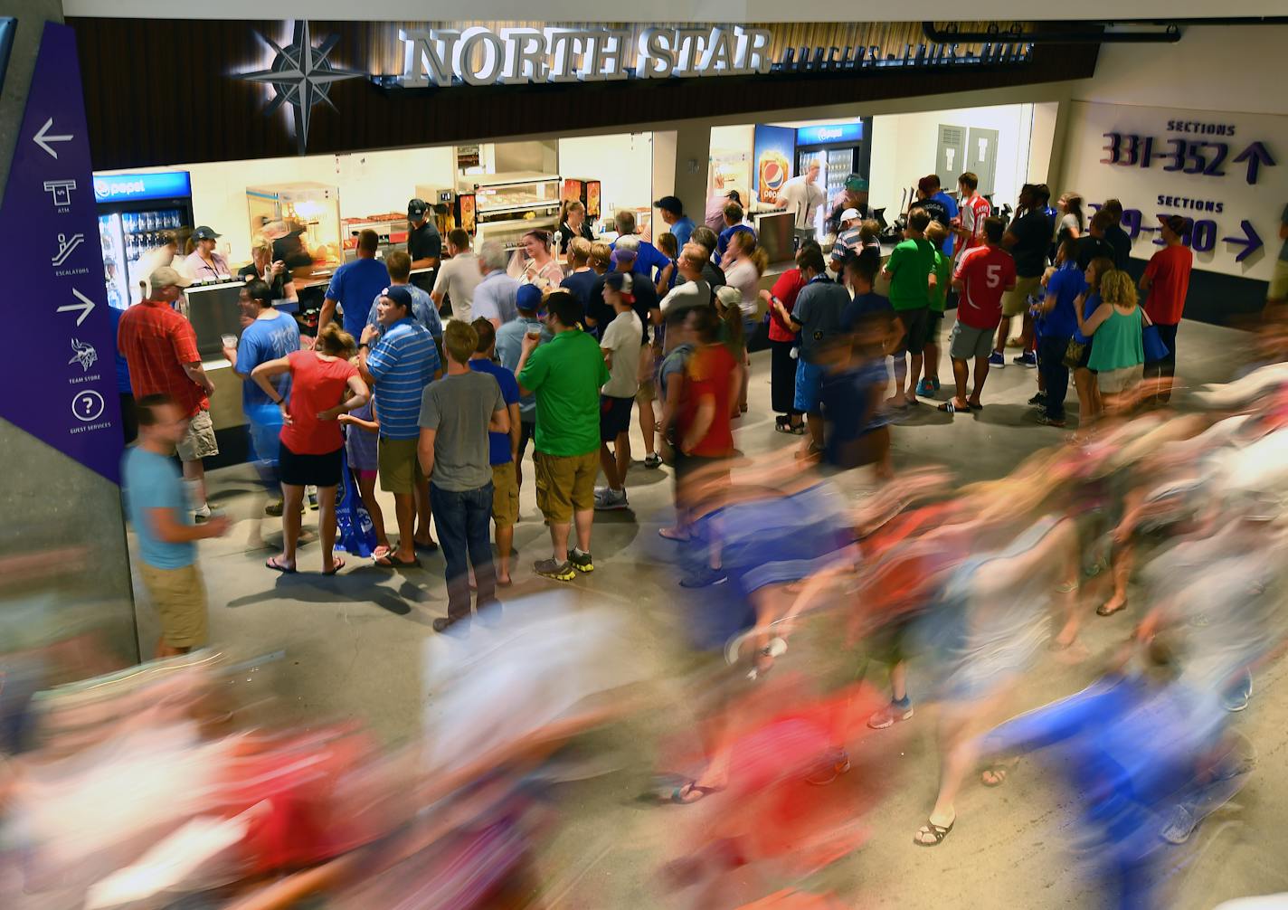 People waited in line for food before the start of Wednesday night's game at US Bank Stadium. ] (AARON LAVINSKY/STAR TRIBUNE) aaron.lavinsky@startribune.com US Bank Stadium opened its doors for its first sporting event Wednesday, as AC Milan played Chelsea FC on Wednesday, August 3, 2016 in Minneapolis, Minn.