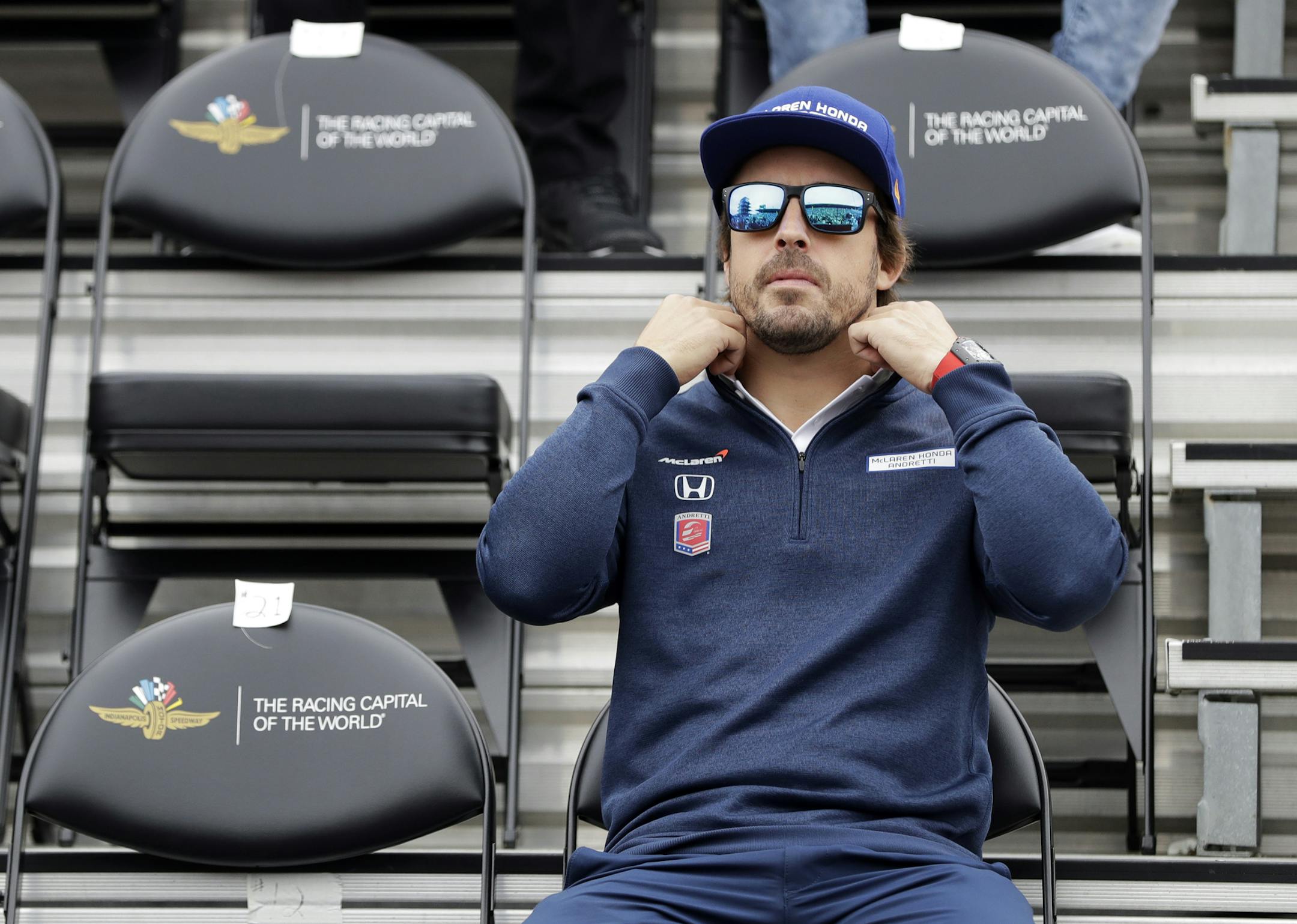 Fernando Alonso, of Spain, waits for the start of the drivers meeting for the Indianapolis 500 auto race at Indianapolis Motor Speedway, Saturday, May 27, 2017 in Indianapolis. The 101st running of the race is Sunday. (AP Photo/Darron Cummings)