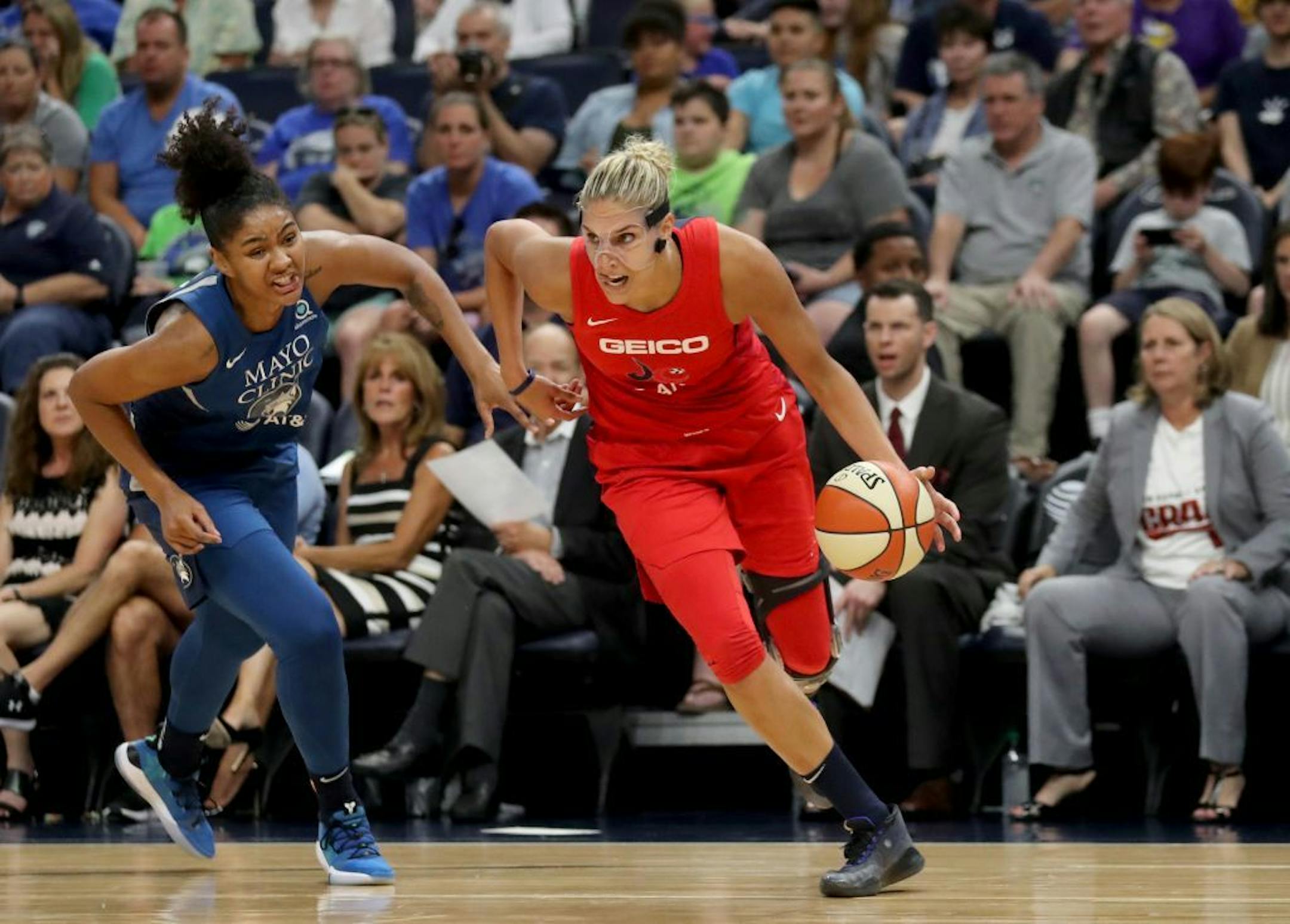 The Lynx's Damiris Dantas (92) loses a step on Elena Delle Donne (11) of the Washington Mystics last August at Target Center.