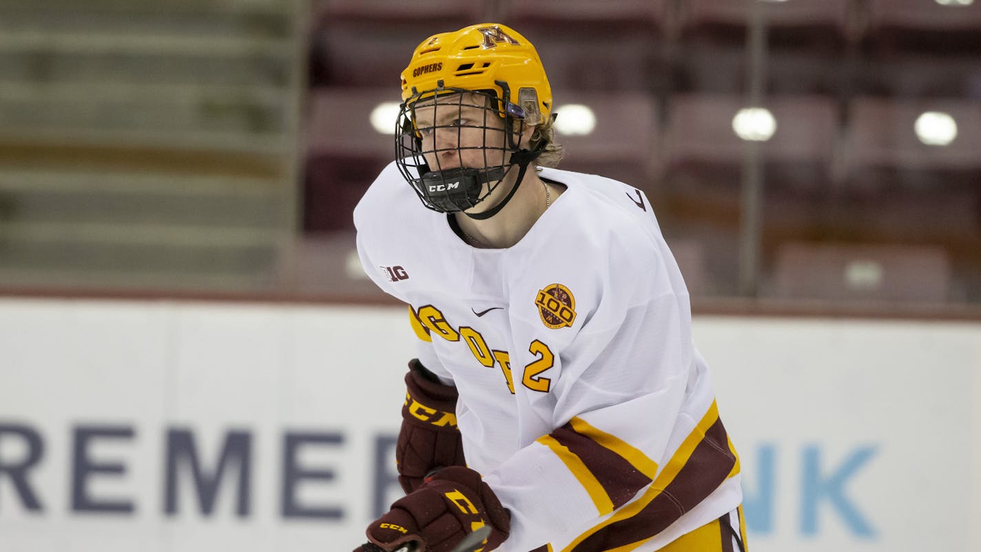 Gophers defenseman Jackson LaCombe (2) skated against Penn State on Nov. 20.