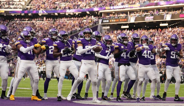 Minnesota Vikings safety Camryn Bynum (24) celebrates an interception before it was called back in the fourth quarter of an NFL game between the Minne