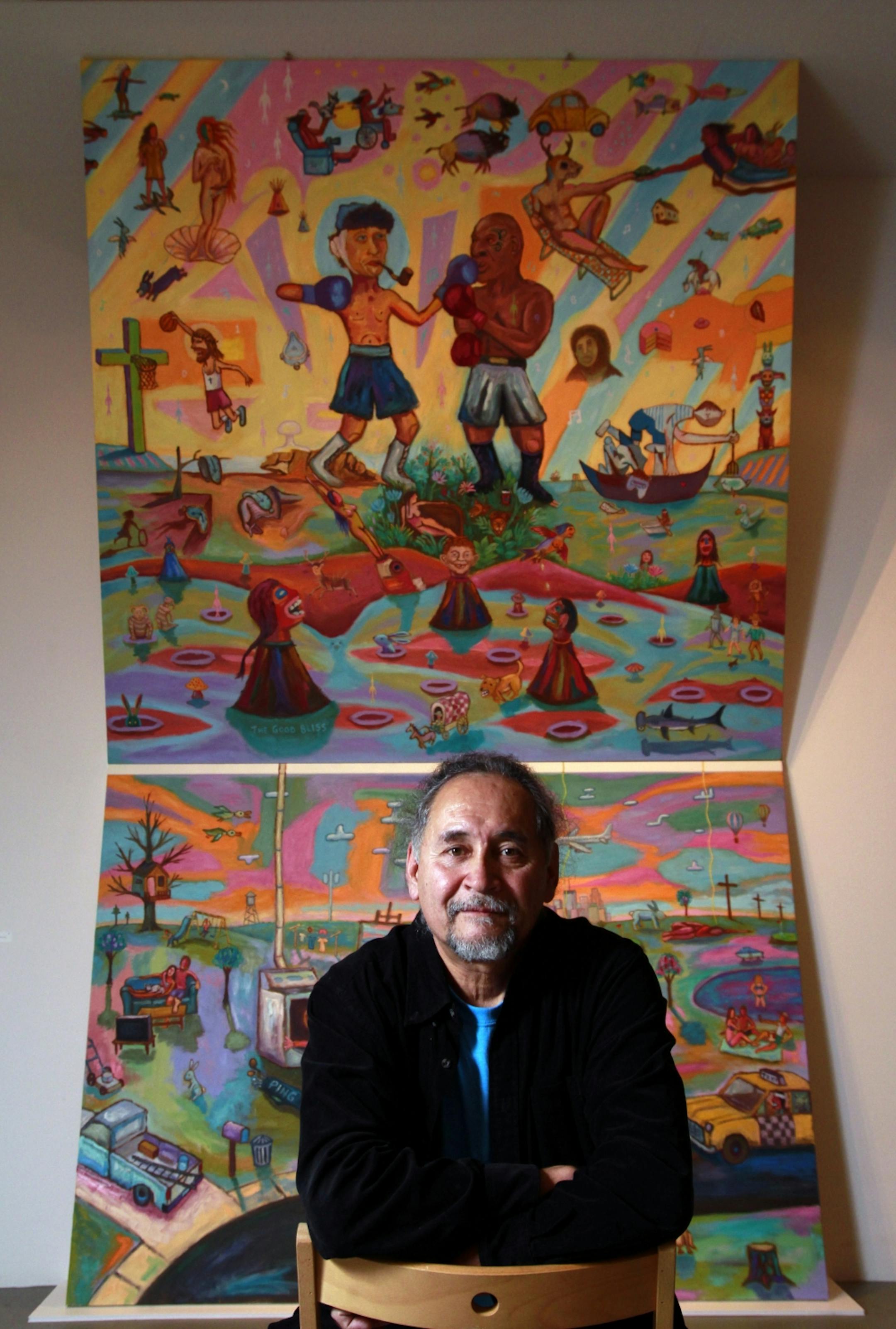 Jim Denomie with his painting "The Creative Oven."