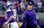 Minnesota Vikings head coach Kevin O’Connell and quarterback Kirk Cousins (8)