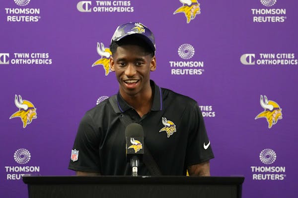 Vikings wide receiver Jordan Addison takes questions from reporters during a press conference the day after he was drafted Friday at the TCO Performan