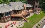 This custom home with acreage in Maple Grove is on the market for $1.995 million.