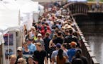 Crowds filled the Minneapolis riverfront last summer for the 25th annual Stone Arch Bridge Festival.