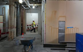 Construction continues on the former Ecolab University Center office building, a 17-story property being converted into 178 market-rate apartments, Fr