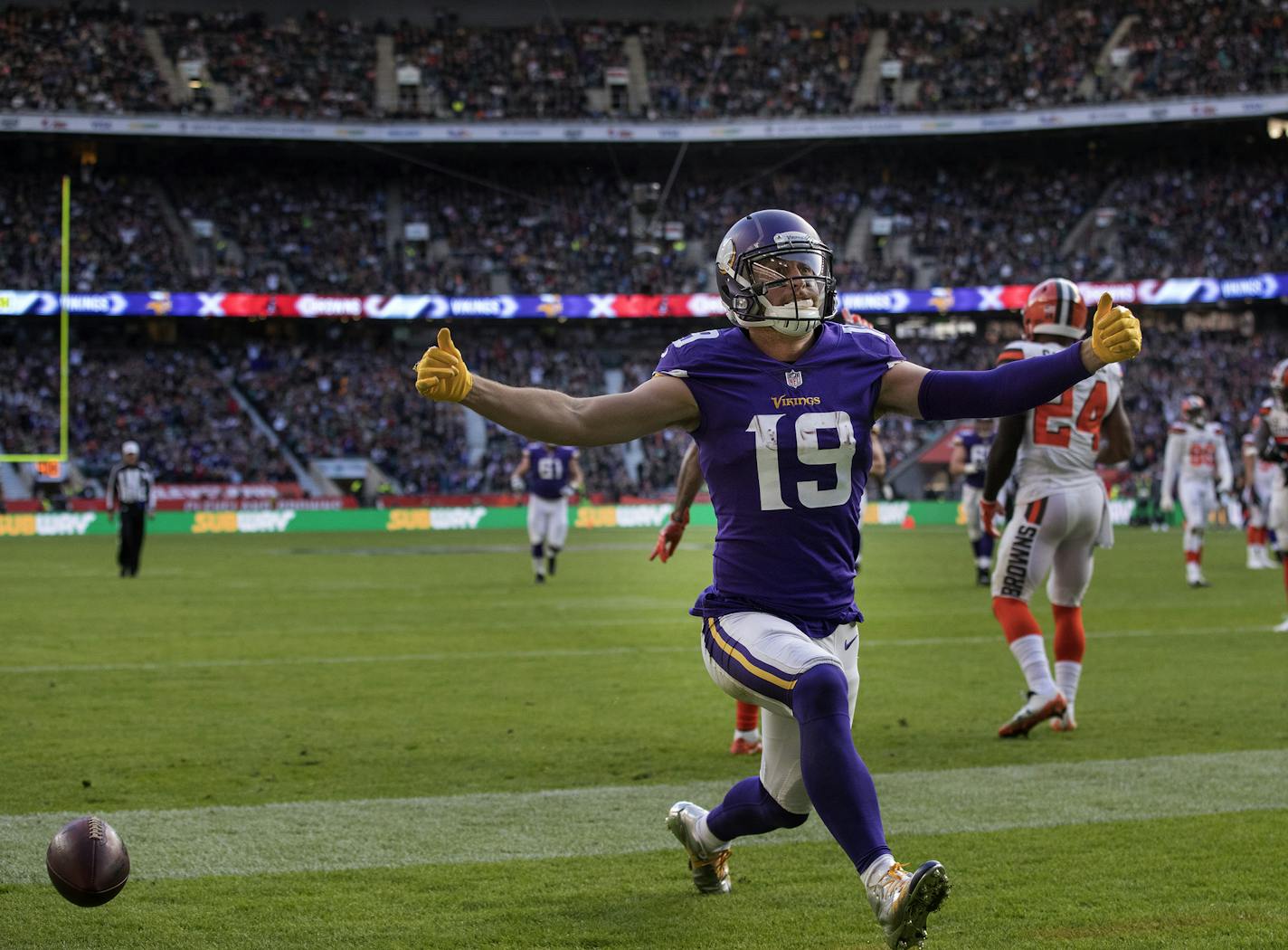 Adam Thielen revved up for a true European celebration — sliding across the turf on his knees — after scoring on an 18-yard touchdown pass in the second quarter Sunday in London.