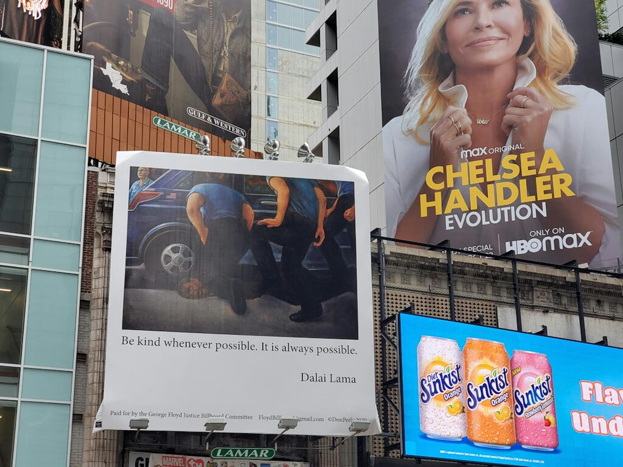 The billboard, based on artwork by Donald Perlis, that went up Tuesday in New York's Times Square.