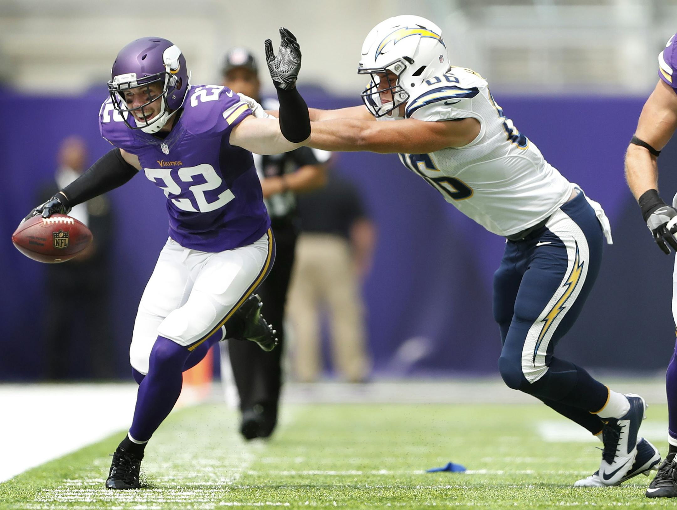 Minnesota Vikings free safety Harrison Smith (22) was pushed out of bounds after intercepting a pass by San Diego Chargers tight end Hunter Henry (86) in the first quarter at U.S. Bank Stadium Sunday August 28, 2016 in Minneapolis, MN. ] The Minnesota Vikings hosted the San Diego Chargers.