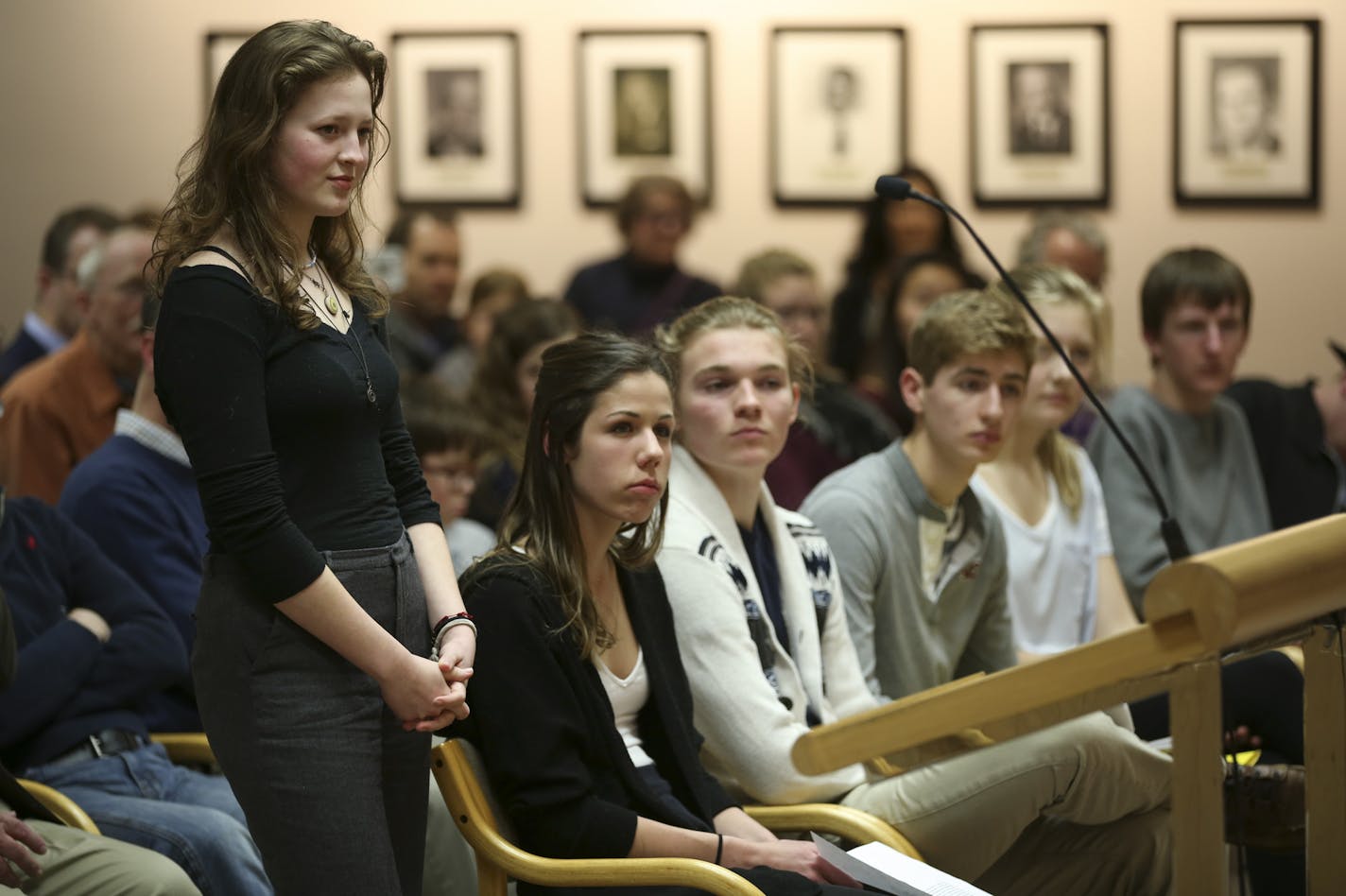 St. Louis Park High School Roots and Shoots members Sophia Skinner, Jayne Stevenson, Owen Geier, and Lukas Wrede, from left, listened to comments from council members after each addressed the St. Louis Park City Council Monday night. ] JEFF WHEELER &#xef; jeff.wheeler@startribune.com Climate change is foremost on St. Louis Park students' minds, and now it's their turn to give out the grades. On Monday evening, March 21, 2016 four members of St. Louis Park High School's Roots and Shoots club issu