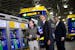 President Obama with Transportation Secretary Anthony Fox and Metro Transit program director Mark Fuhrmann. Fuhrmann bought the president a ticket and