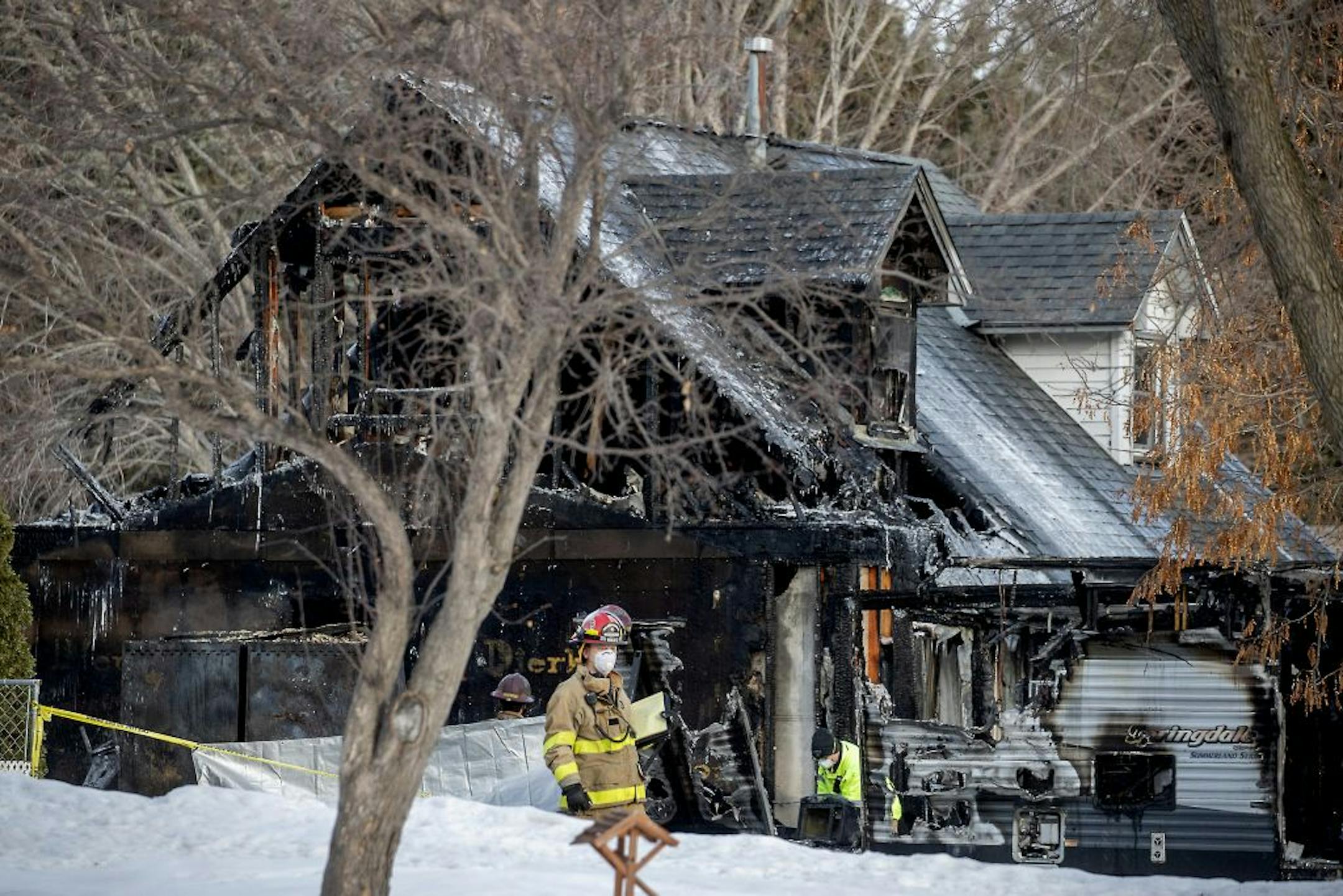 Andover and Centennial firefighters investigated the scene of a house fire in Andover.