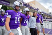 St. Thomas head coach Glenn Caruso leads his team on to the field before an NCAA football game between St. Thomas and Michigan Tech Saturday, Sept. 10