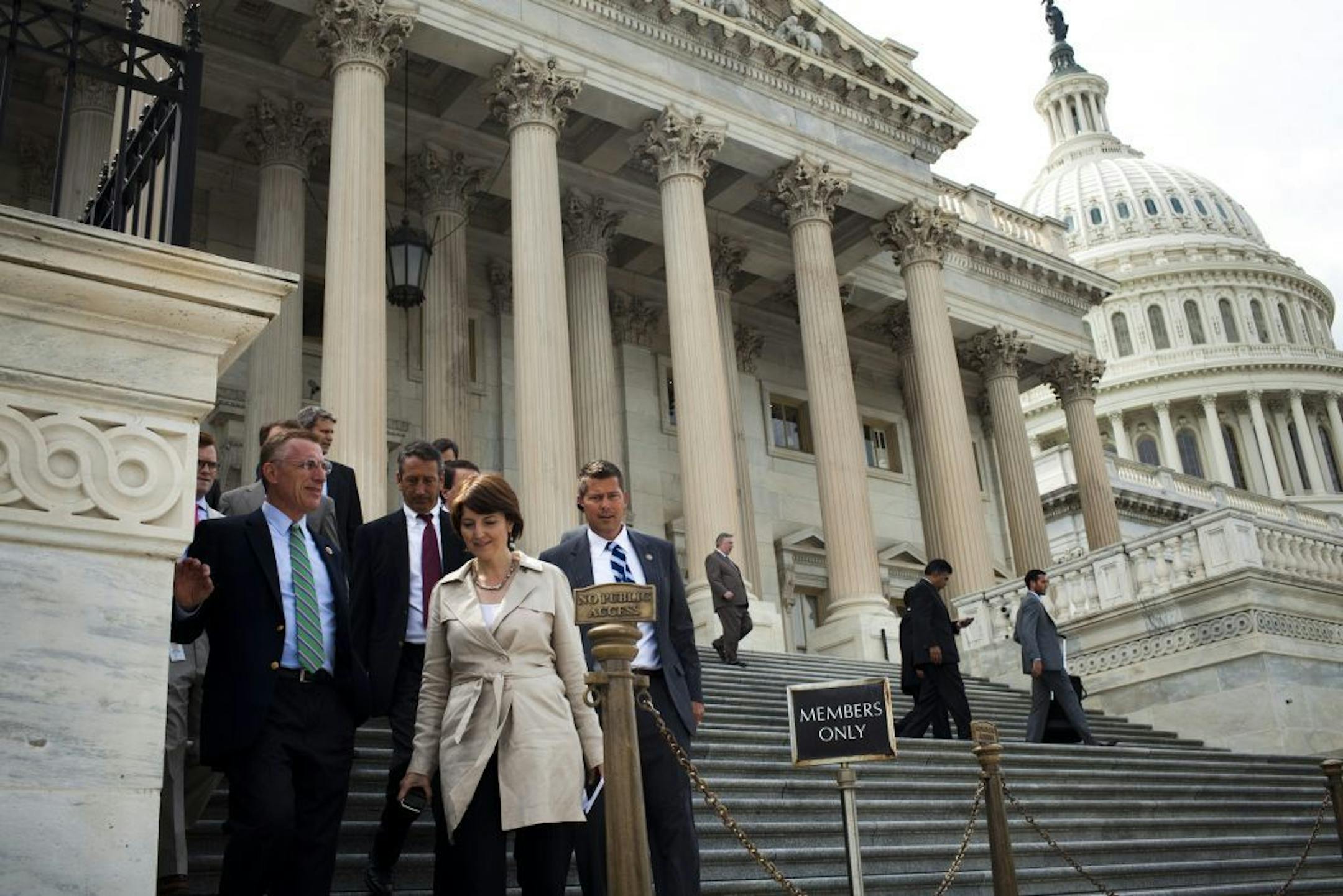 Members of the House exit the Capitol after a House vote on a farm bill, in Washington, July 11, 2013. Republicans muscled a pared-back agriculture bill through the House on Thursday, stripping out the food stamp program to satisfy recalcitrant conservatives but losing what little Democratic support the bill had when it failed last month. From left: Reps. Tim Murphy (R-Pa.), Mark Sanford (R-S.C.), Cathy McMorris Rodgers (R-Wash.), and Sean Duffy (R-Wis.).