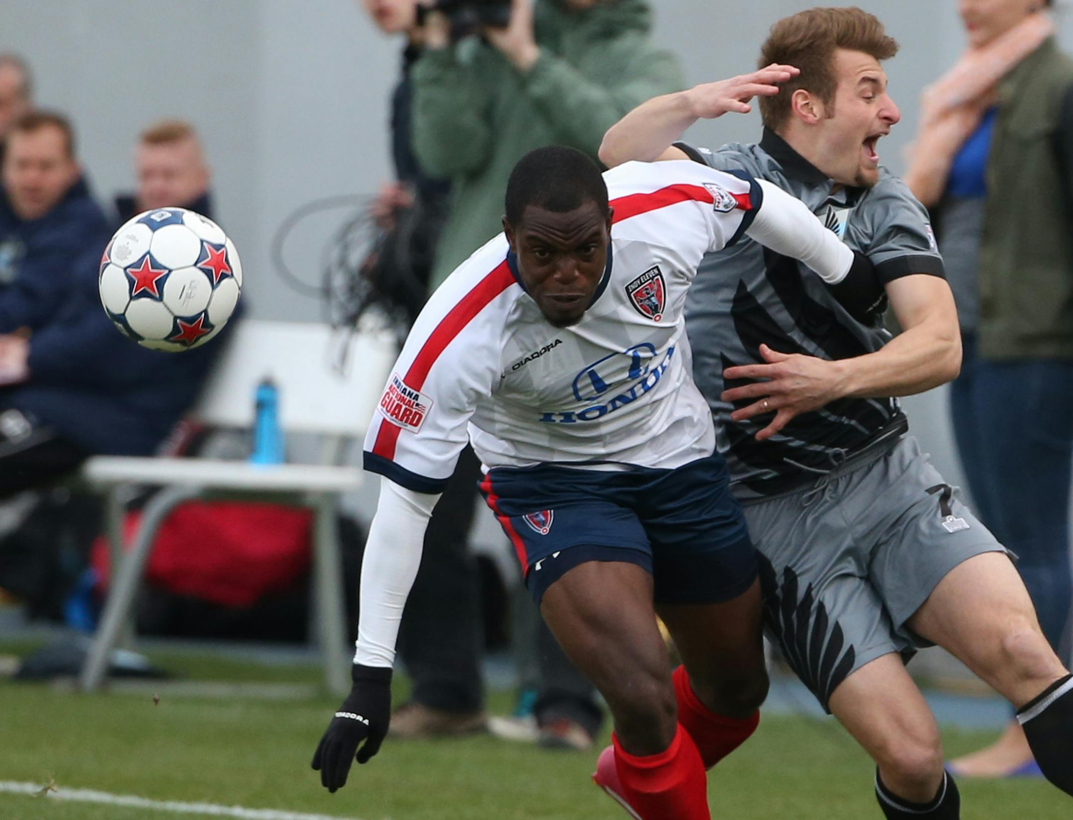 Minnesota United FC's Simone Bracalello and Indy Eleven's Fijero Okiomah fought for possession of the ball in the first half ] (KYNDELL HARKNESS/STAR TRIBUNE) kyndell.harkness@startribune.com Minnesota United FC vs Indy Eleven at the National Sports Center in Blaine Min., Saturday, May 3, 2014.