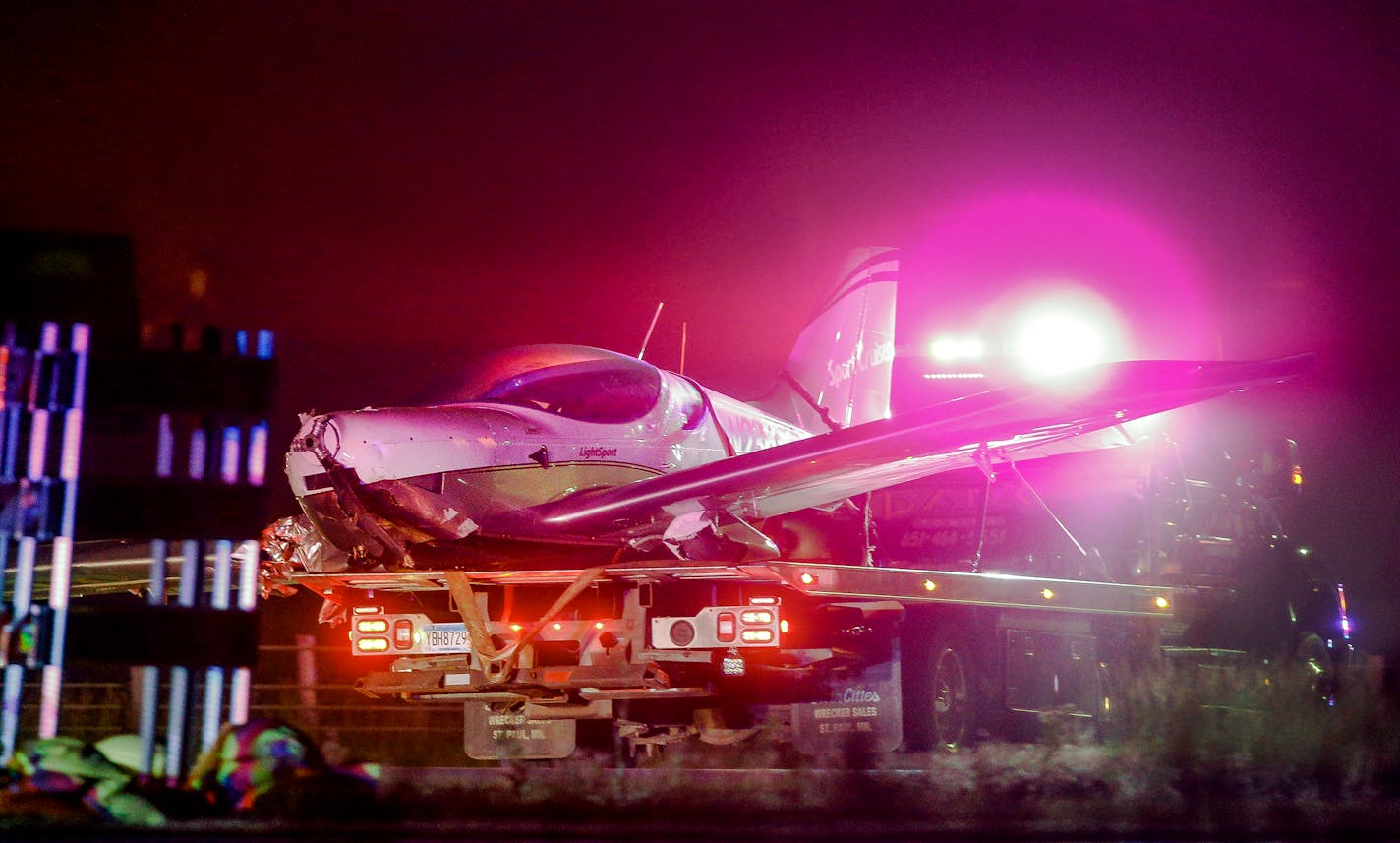 A 2007 SportCruiser is towed on Interstate 35 on July 1, 2016 in Wyoming, Minn. The aircraft needed to make an emergency landing near the intersection of U.S. 61 and I-35.