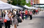 Streets were filled with shoppers at the Nicollet Farmers Market on a Thursday afternoon in downtown Minneapolis.