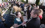 Matt and Chantelle Shoff of Maplewood were among the 57 couples that renewed their vows on the centennial celebration weekend of the Como Conservatory